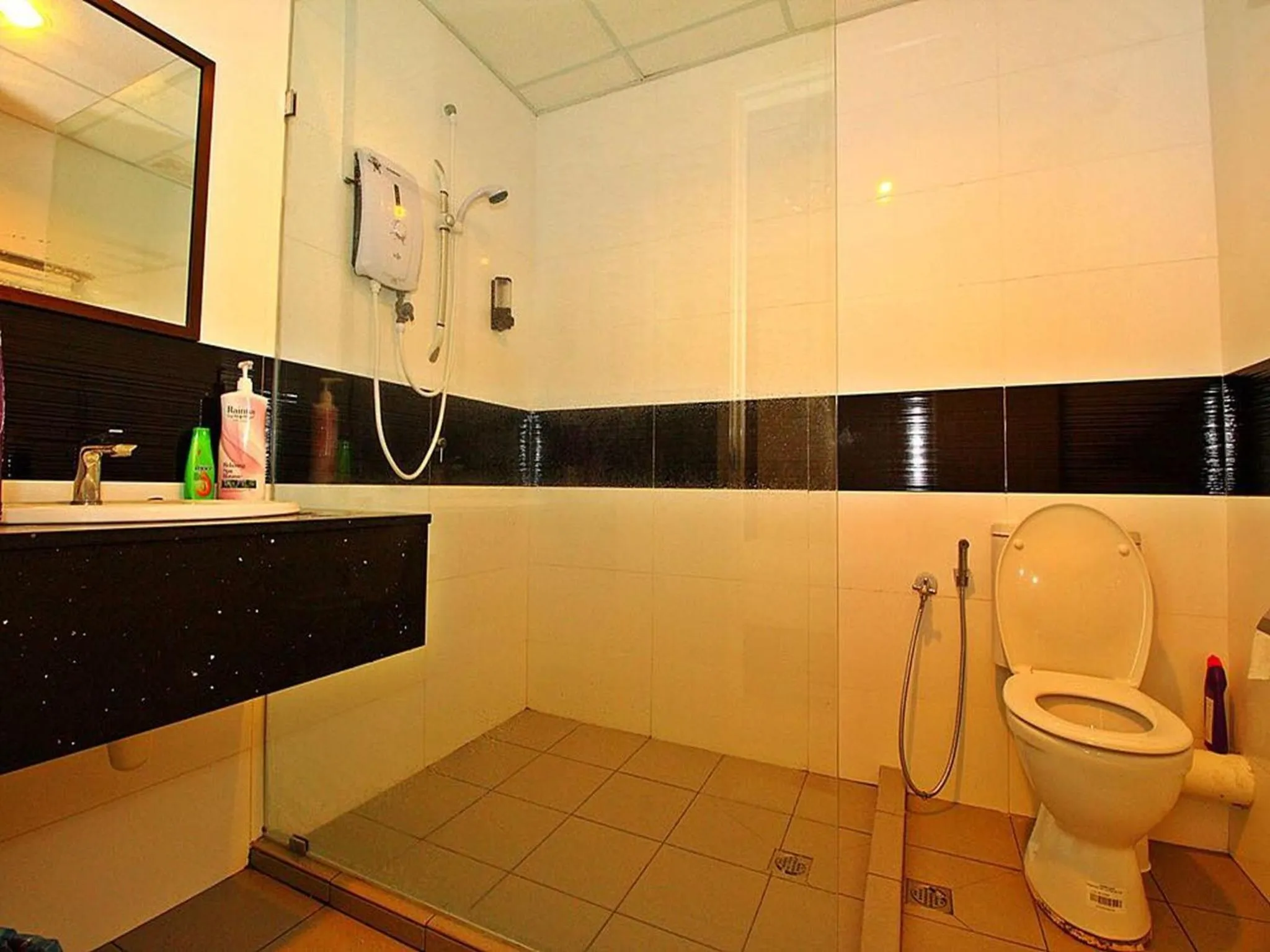 Bathroom in Merlene Suites at Mansion One Formerly know as Mansion One Suites