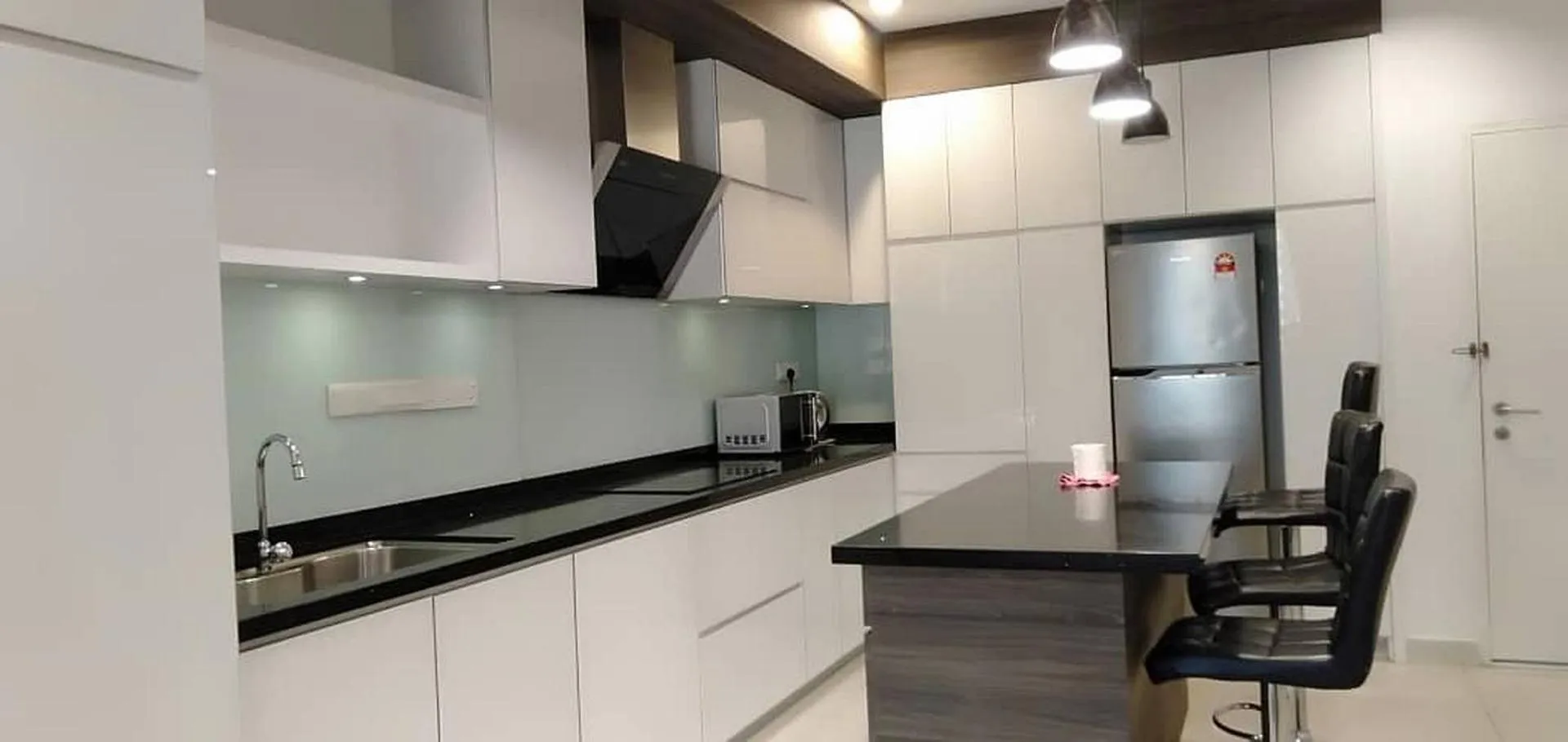 Kitchen or kitchenette in Merlene Suites at Mansion One Formerly know as Mansion One Suites