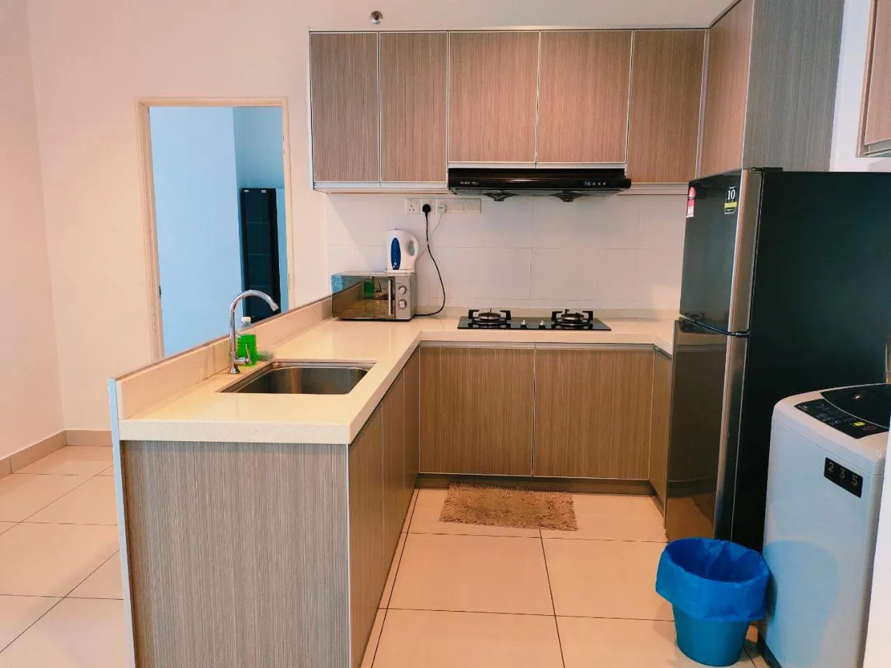 Kitchen or kitchenette in Merlene Suites at Mansion One Formerly know as Mansion One Suites