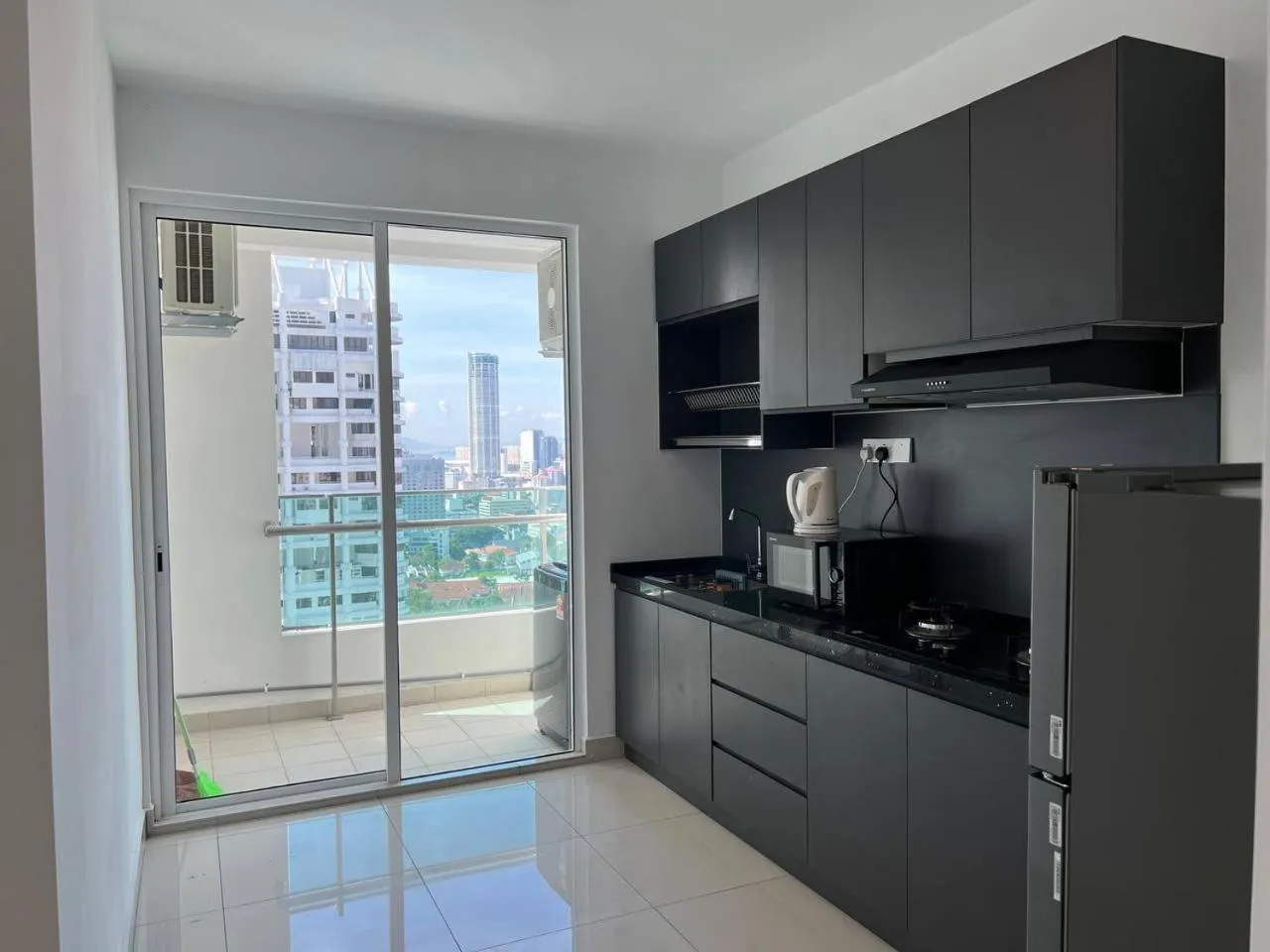 Kitchen or kitchenette in Merlene Suites at Mansion One Formerly know as Mansion One Suites