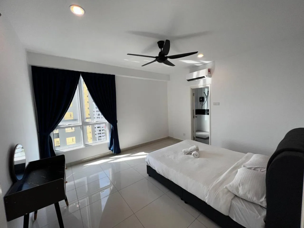 Photo of the whole room, Bed in Merlene Suites at Mansion One Formerly know as Mansion One Suites