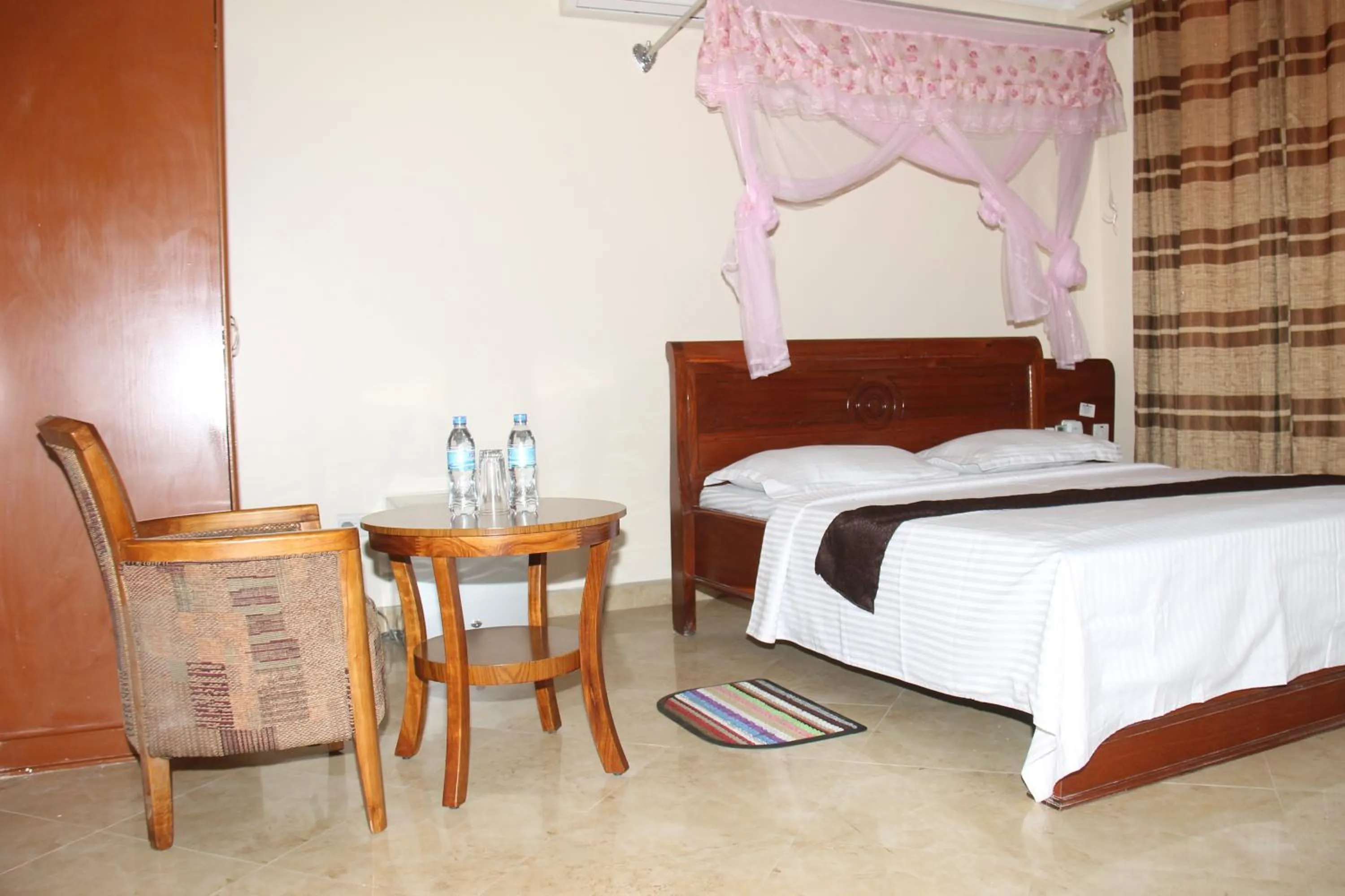 Bed in Silver Paradise Hotel