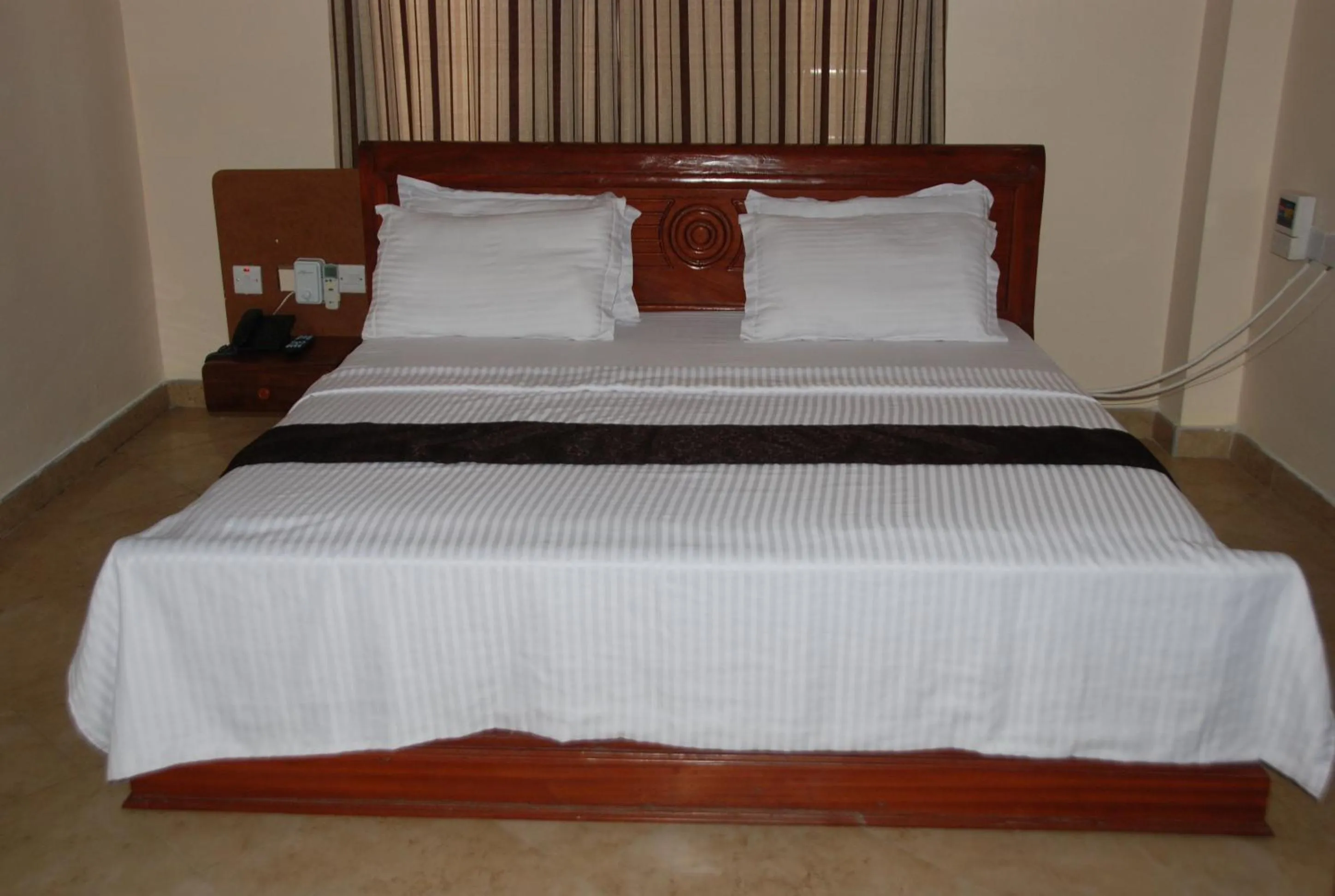 Bed in Silver Paradise Hotel