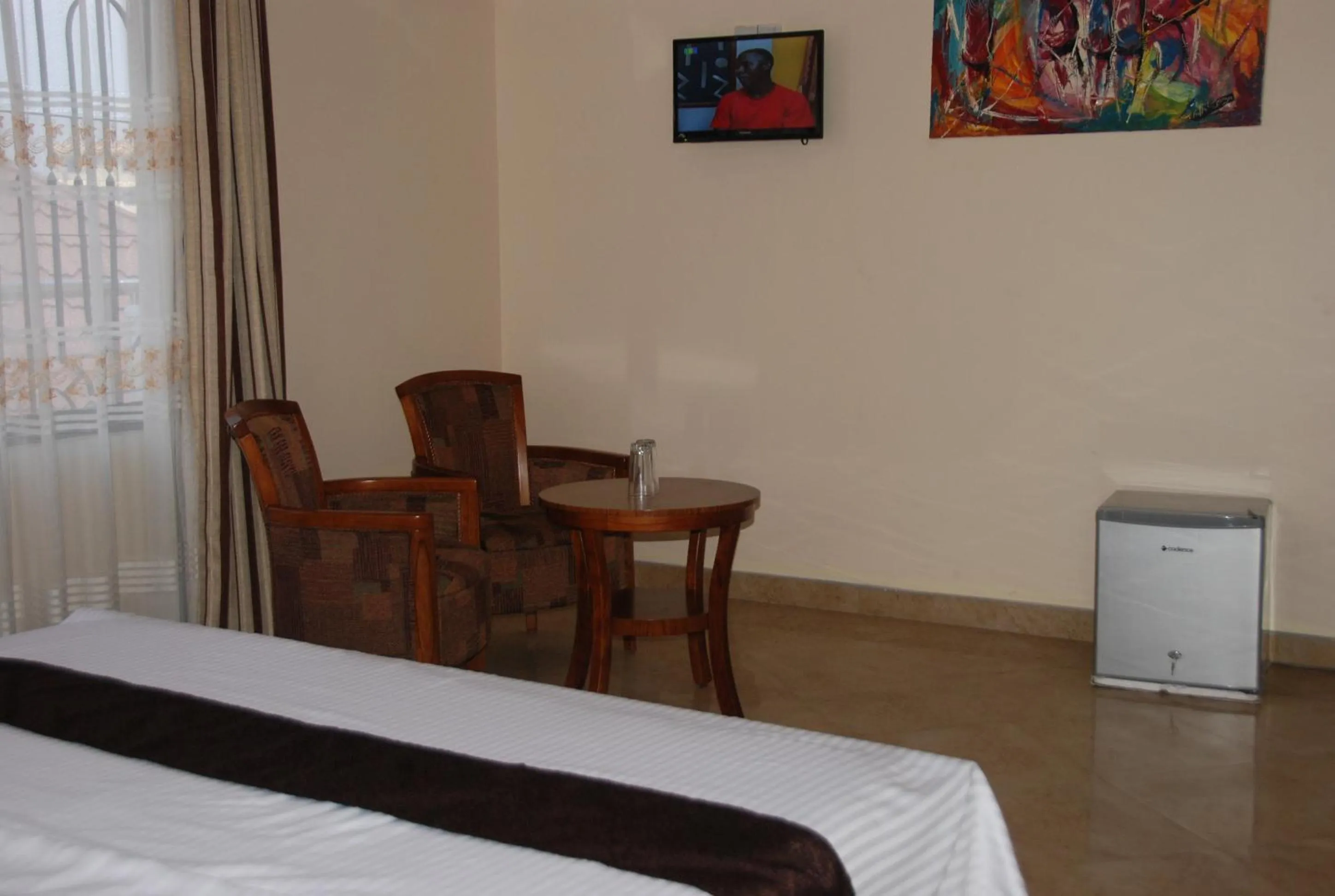 Dining area, Bed in Silver Paradise Hotel