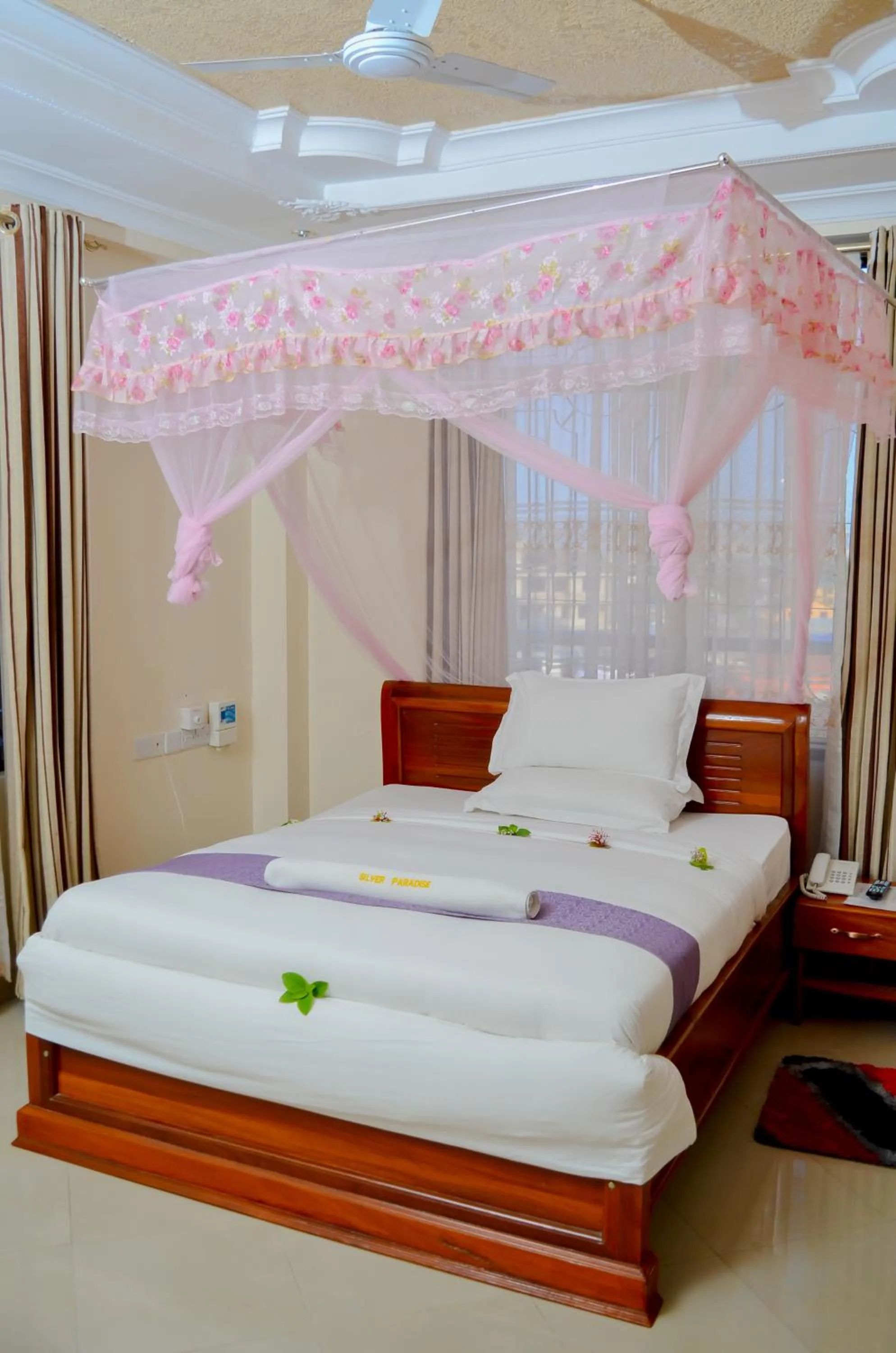 Bed in Silver Paradise Hotel