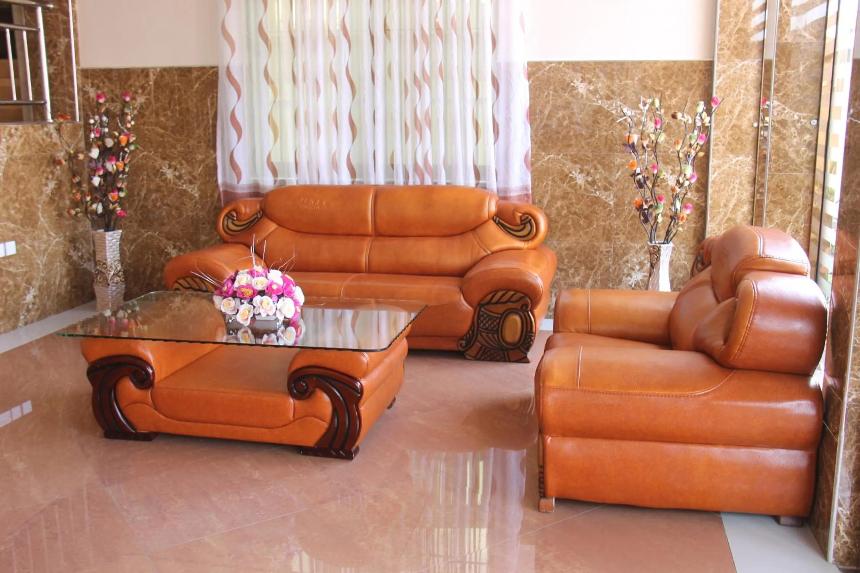 Communal lounge/ TV room in Silver Paradise Hotel