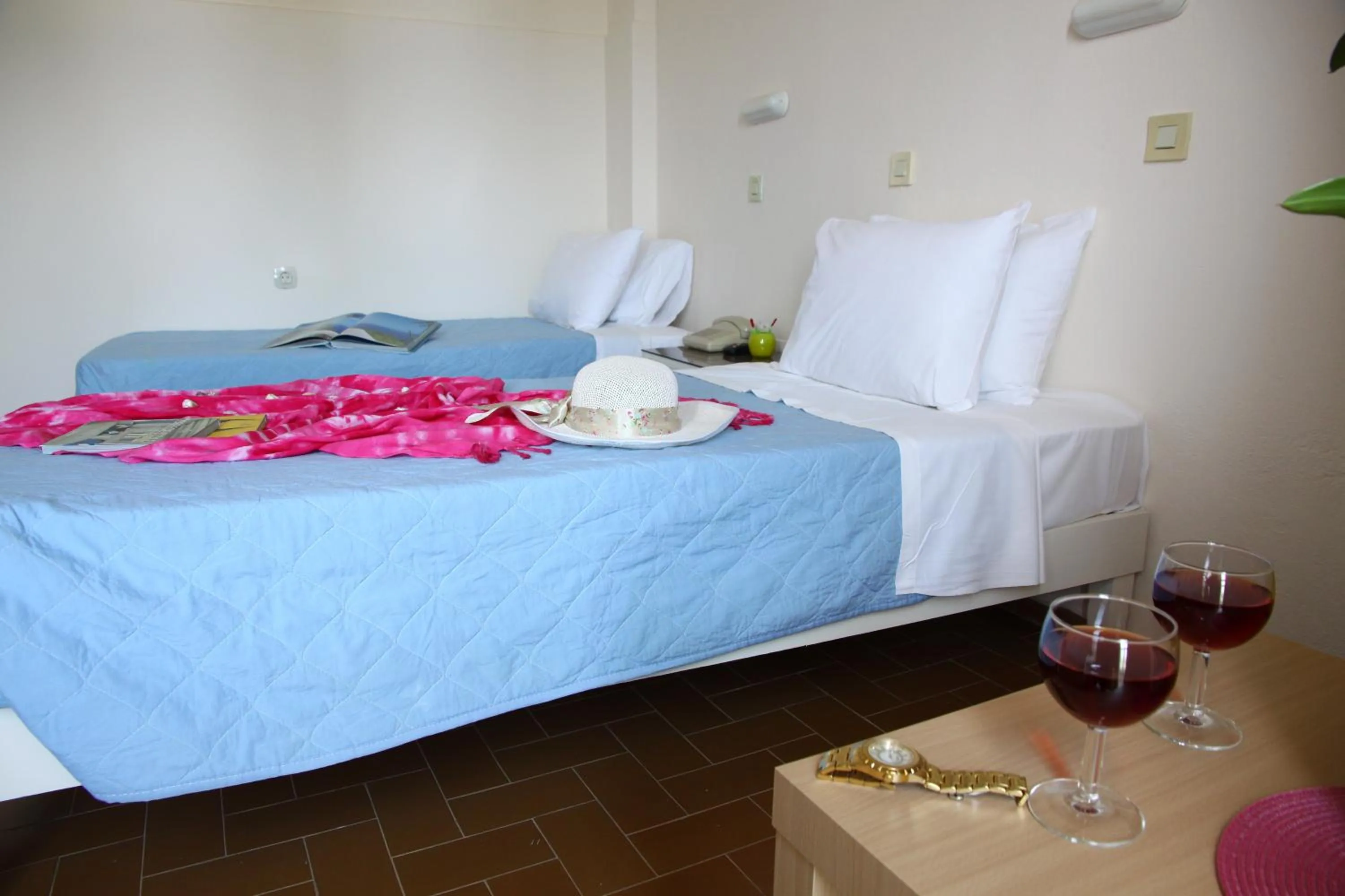 Bedroom in Triton Garden Hotel