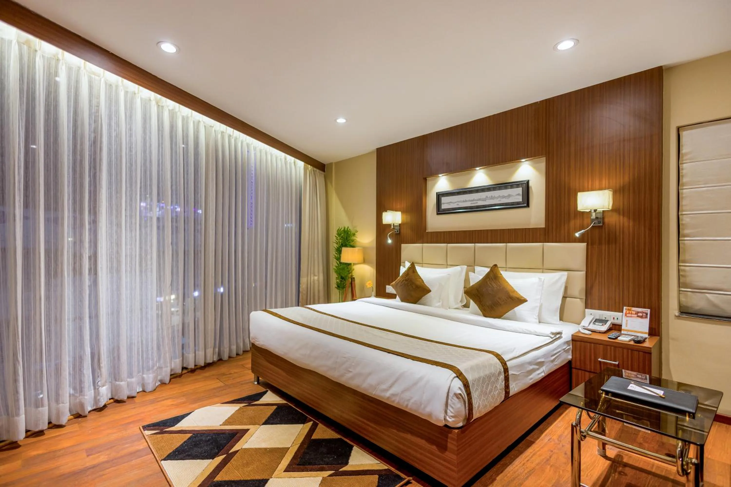 Bed in Hotel Sawood International