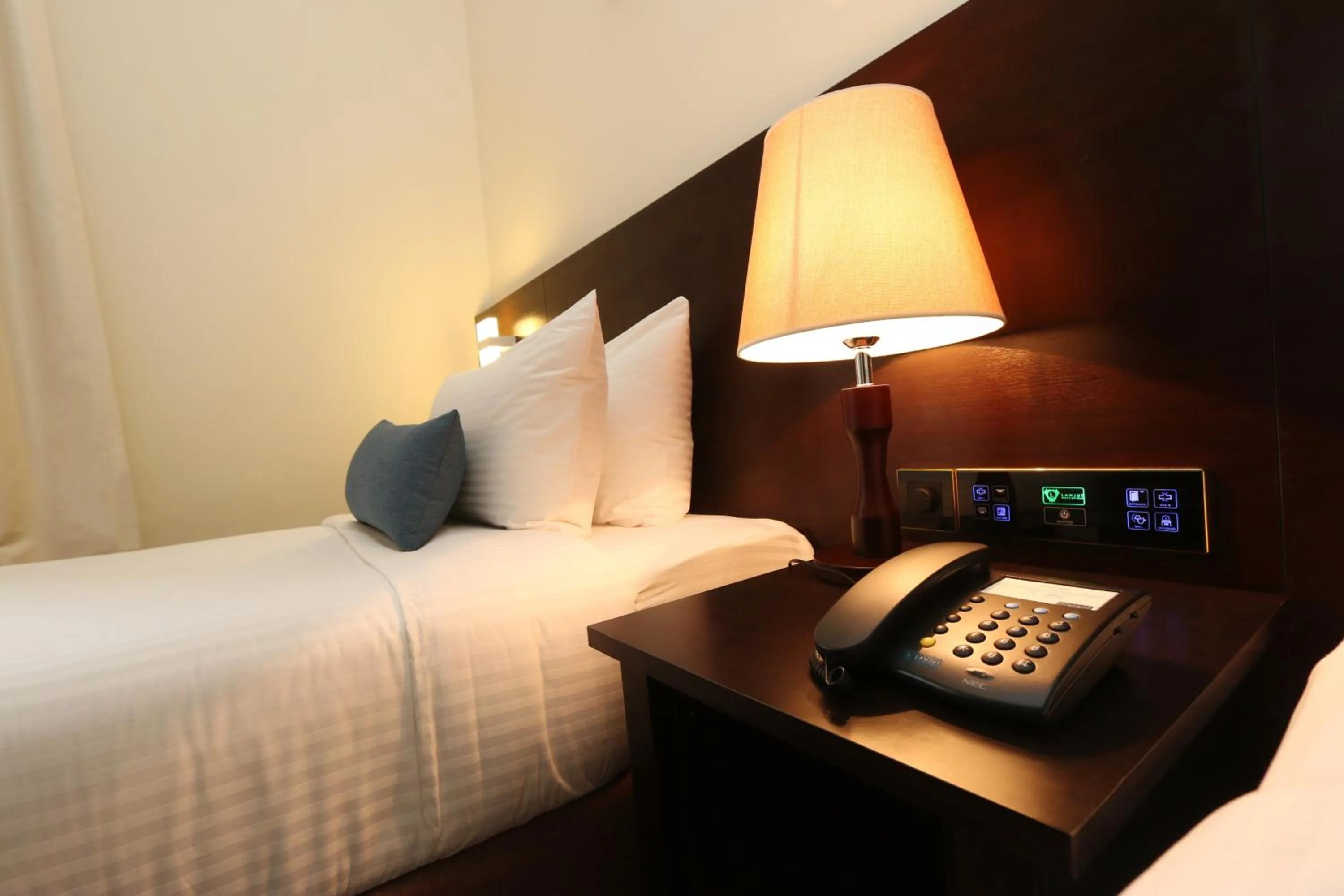 Bed in Villea Rompin Resort & Golf