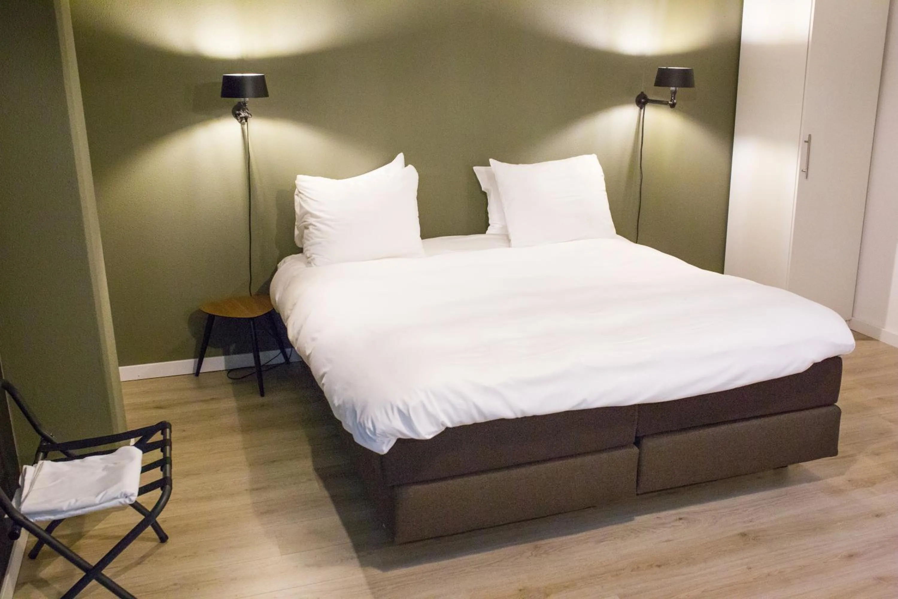 Bed in The Duke Boutique Apartments