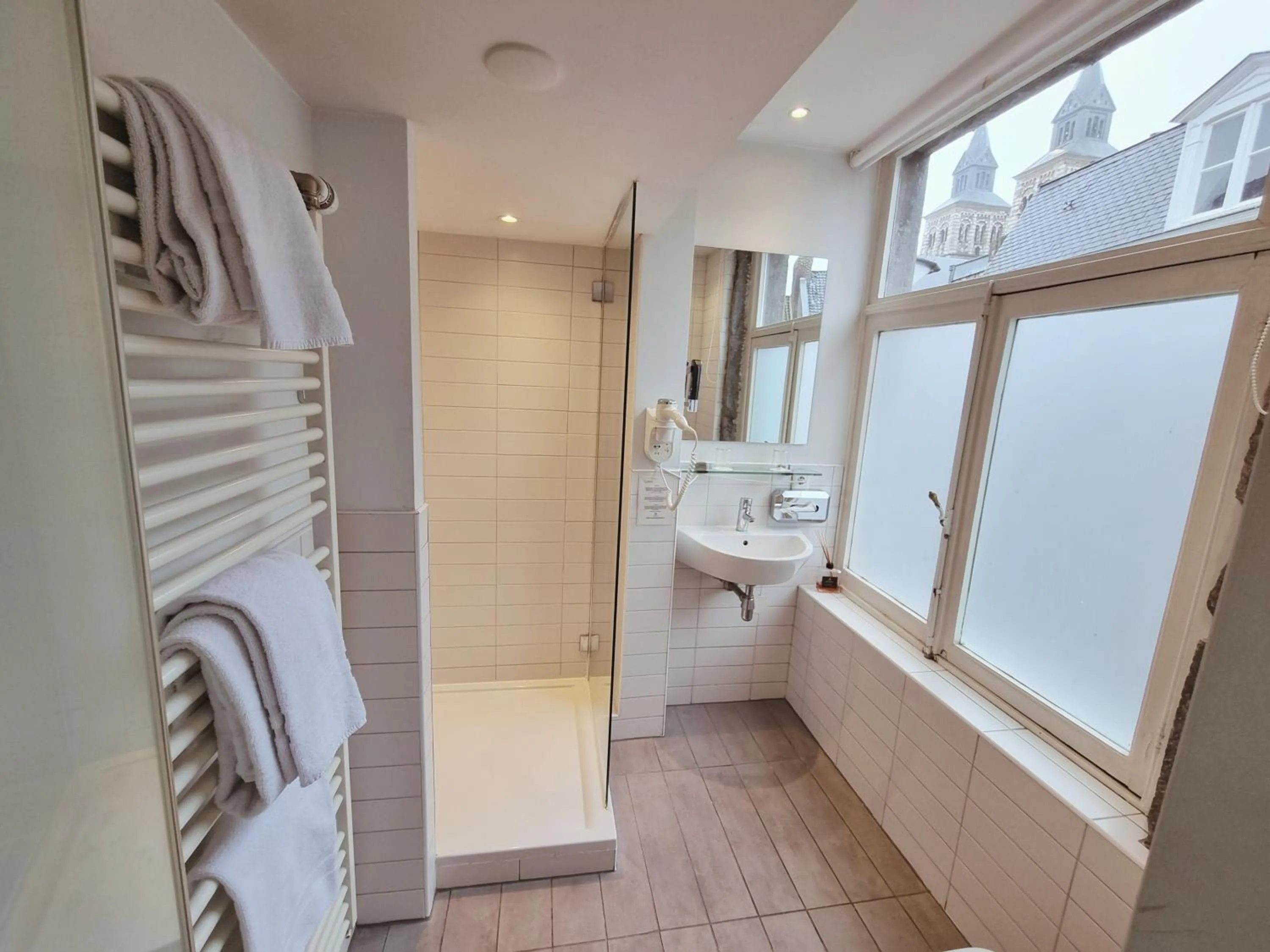 Bathroom in Saillant Hotel Maastricht City Centre - Auping Hotel Partner