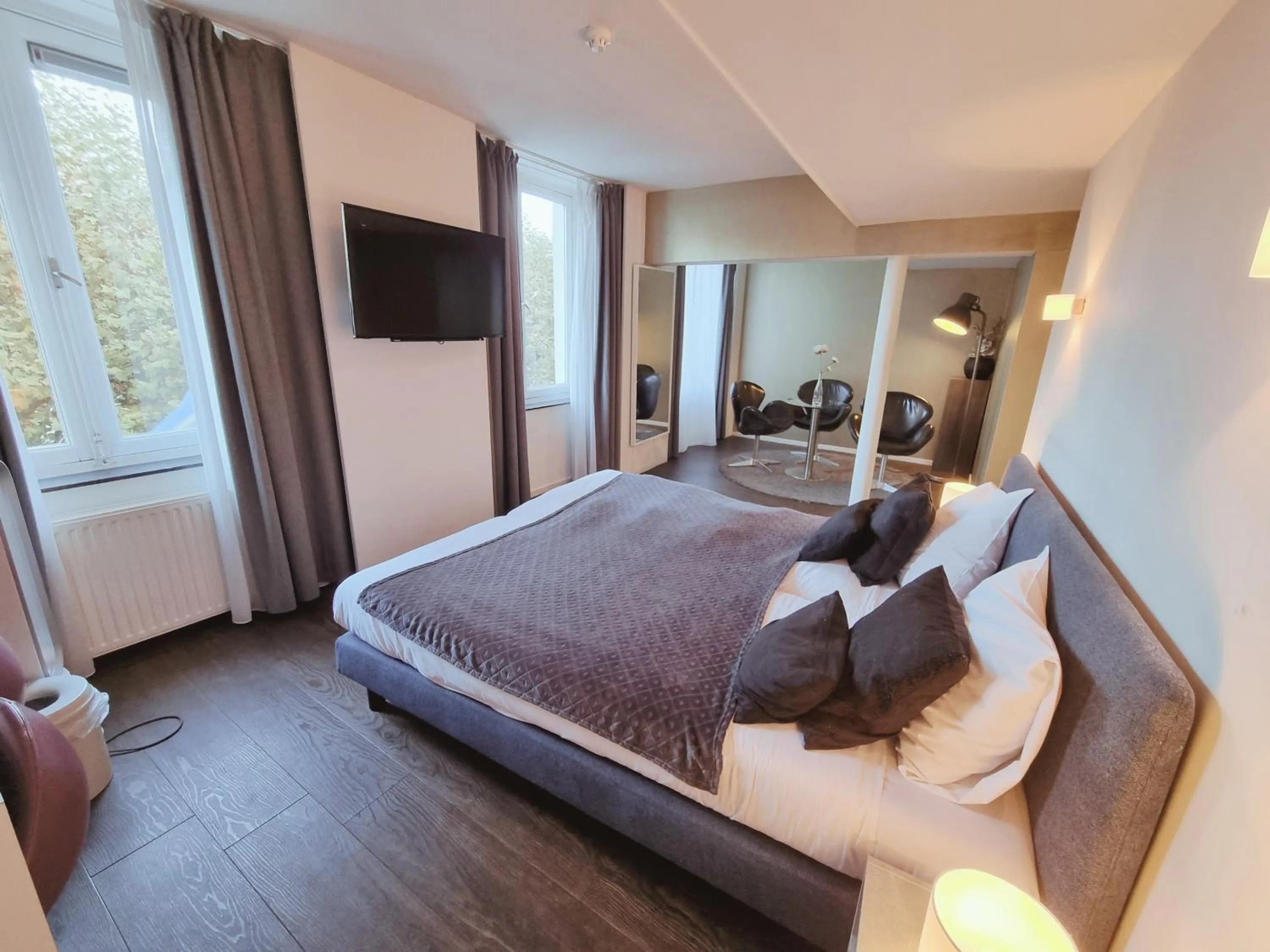 Photo of the whole room, Bed in Saillant Hotel Maastricht City Centre - Auping Hotel Partner
