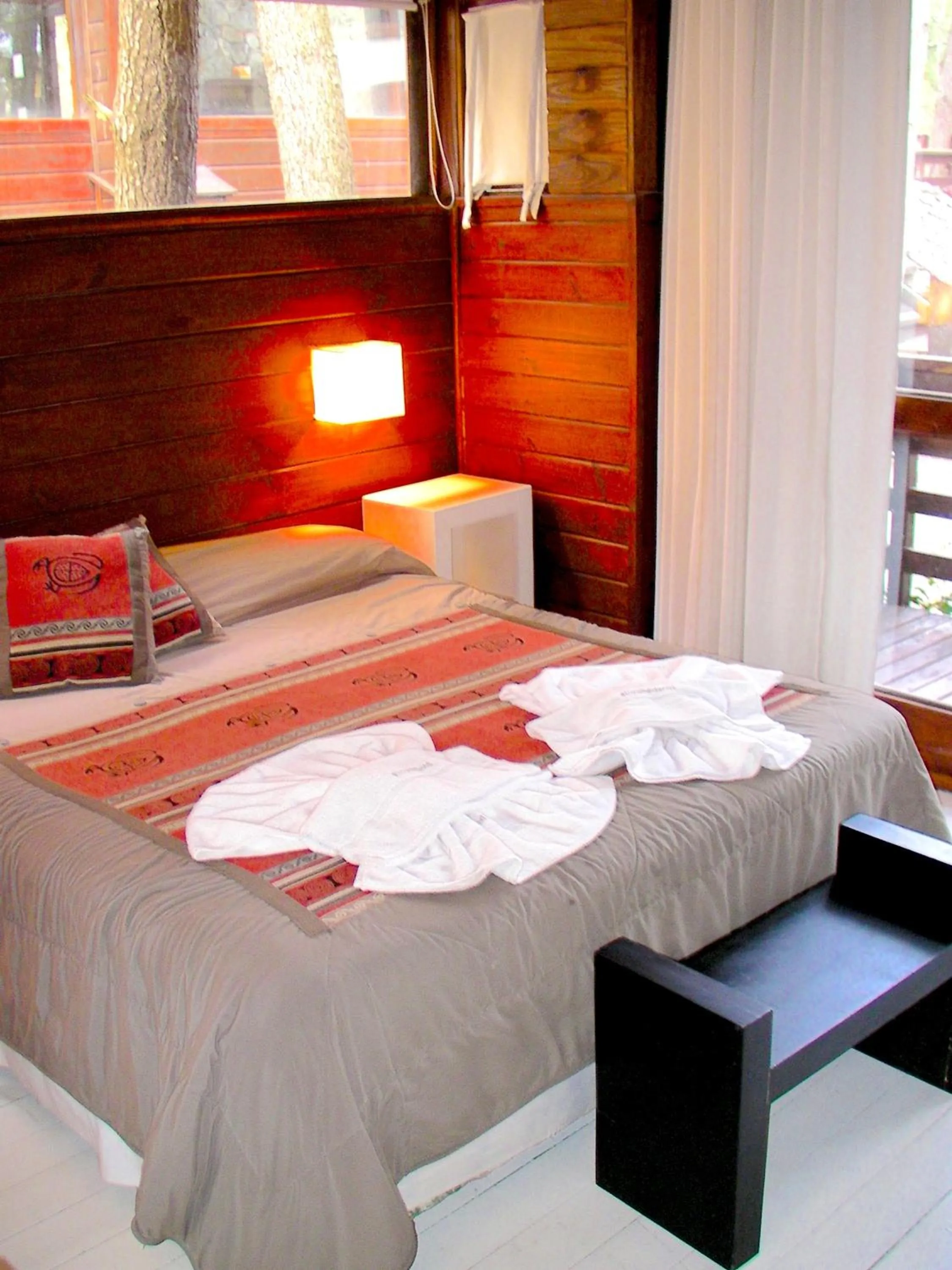 Photo of the whole room, Bed in Altos Medanos Cabañas & Club de Bosque