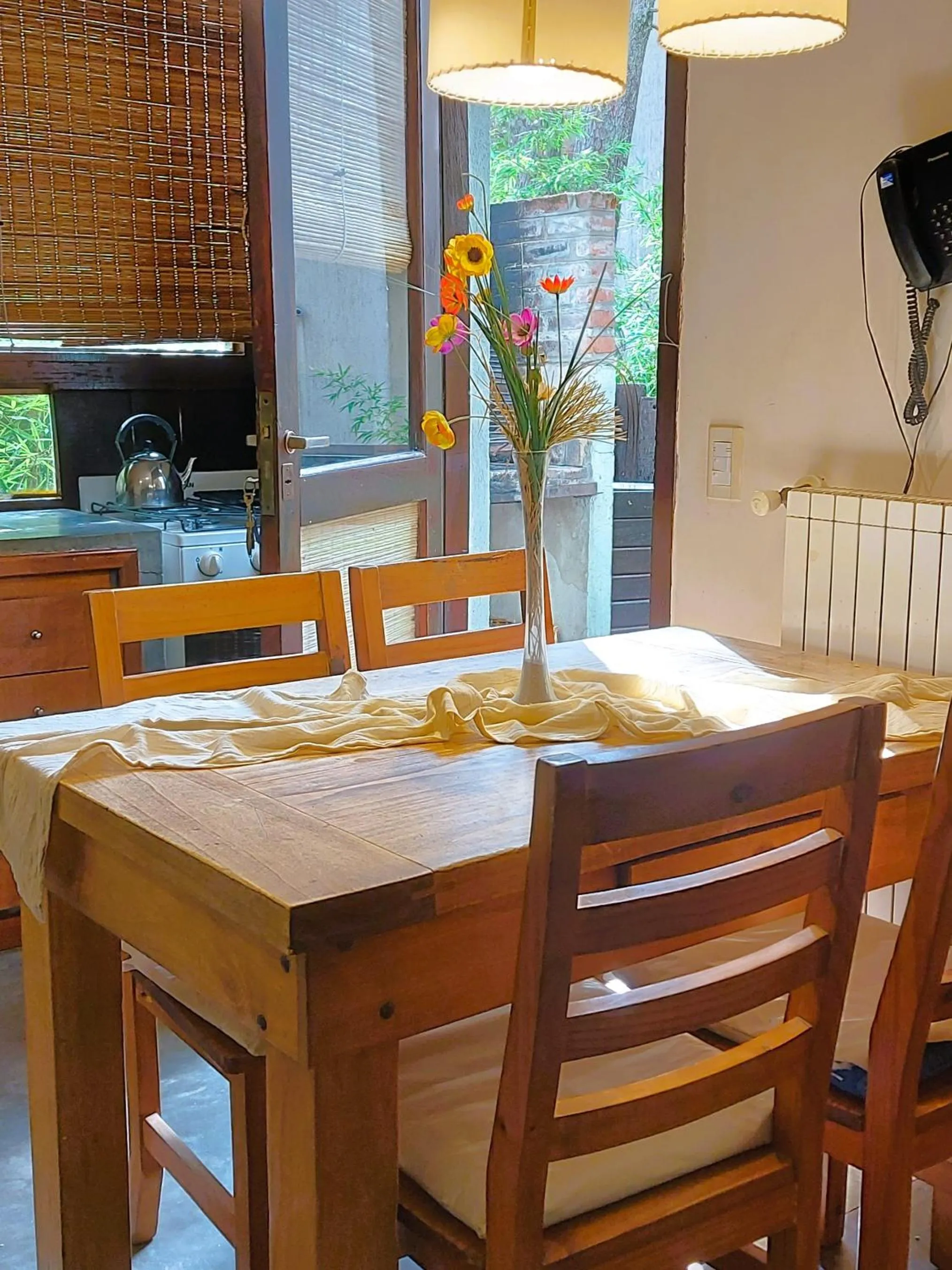 Kitchen or kitchenette in Altos Medanos Cabañas & Club de Bosque