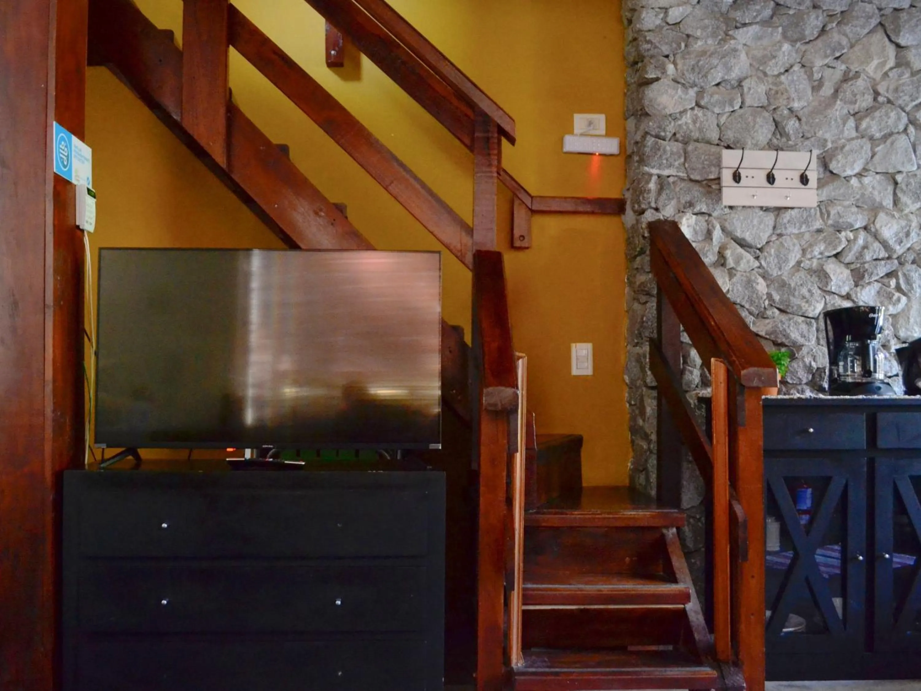 TV and multimedia in Altos Medanos Cabañas & Club de Bosque