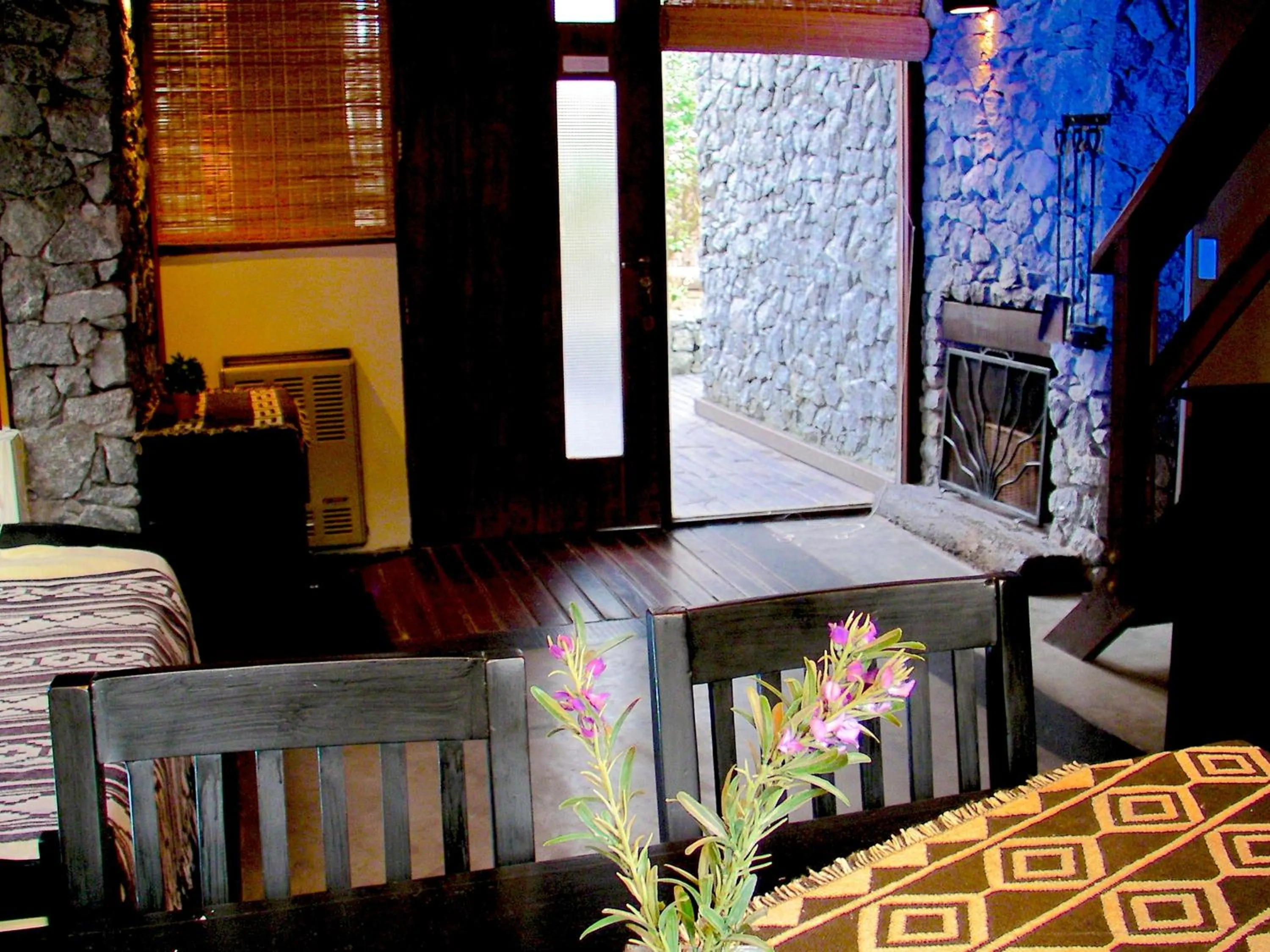 Living room, Bed in Altos Medanos Cabañas & Club de Bosque