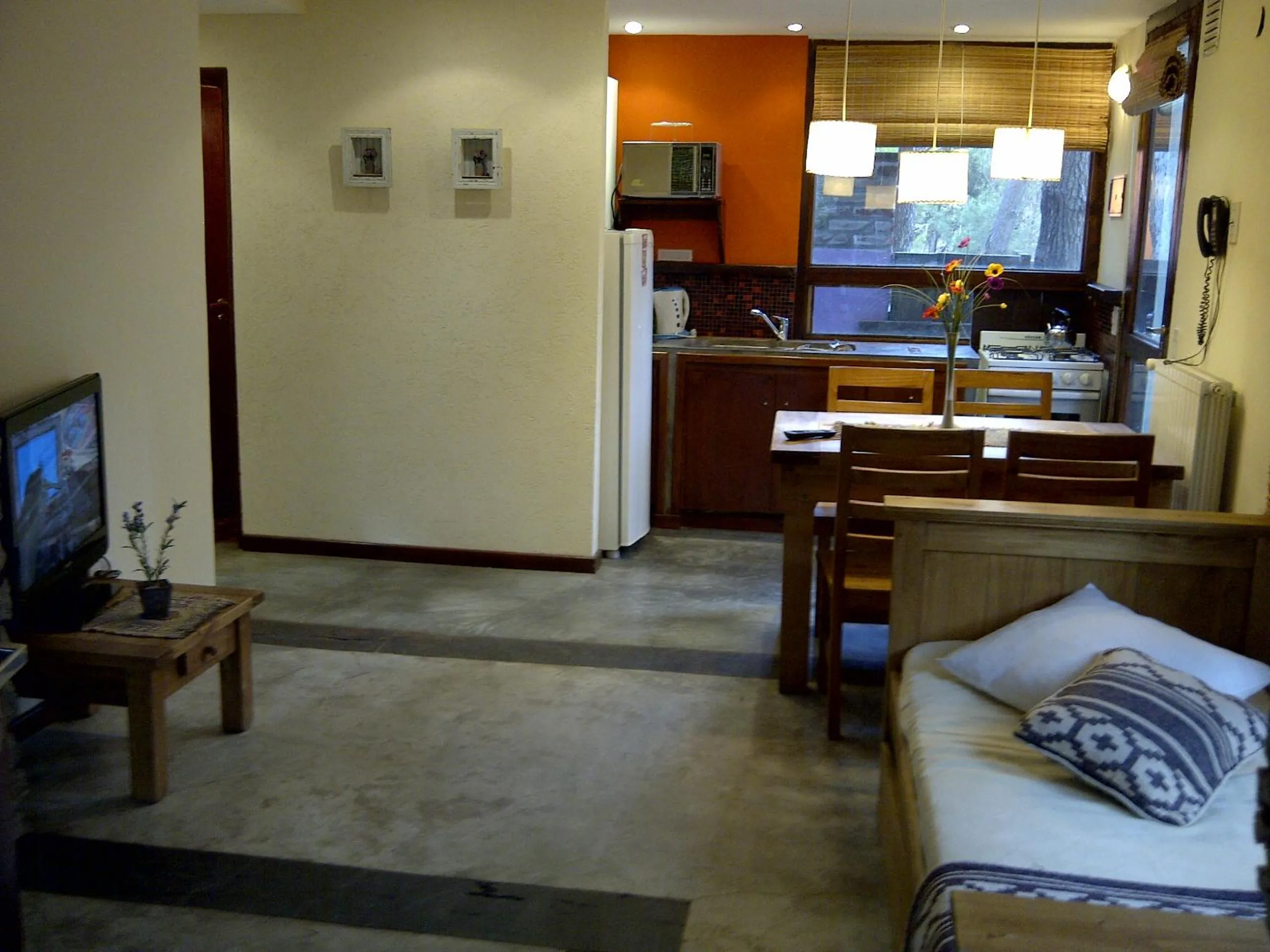 TV and multimedia, Bed in Altos Medanos Cabañas & Club de Bosque