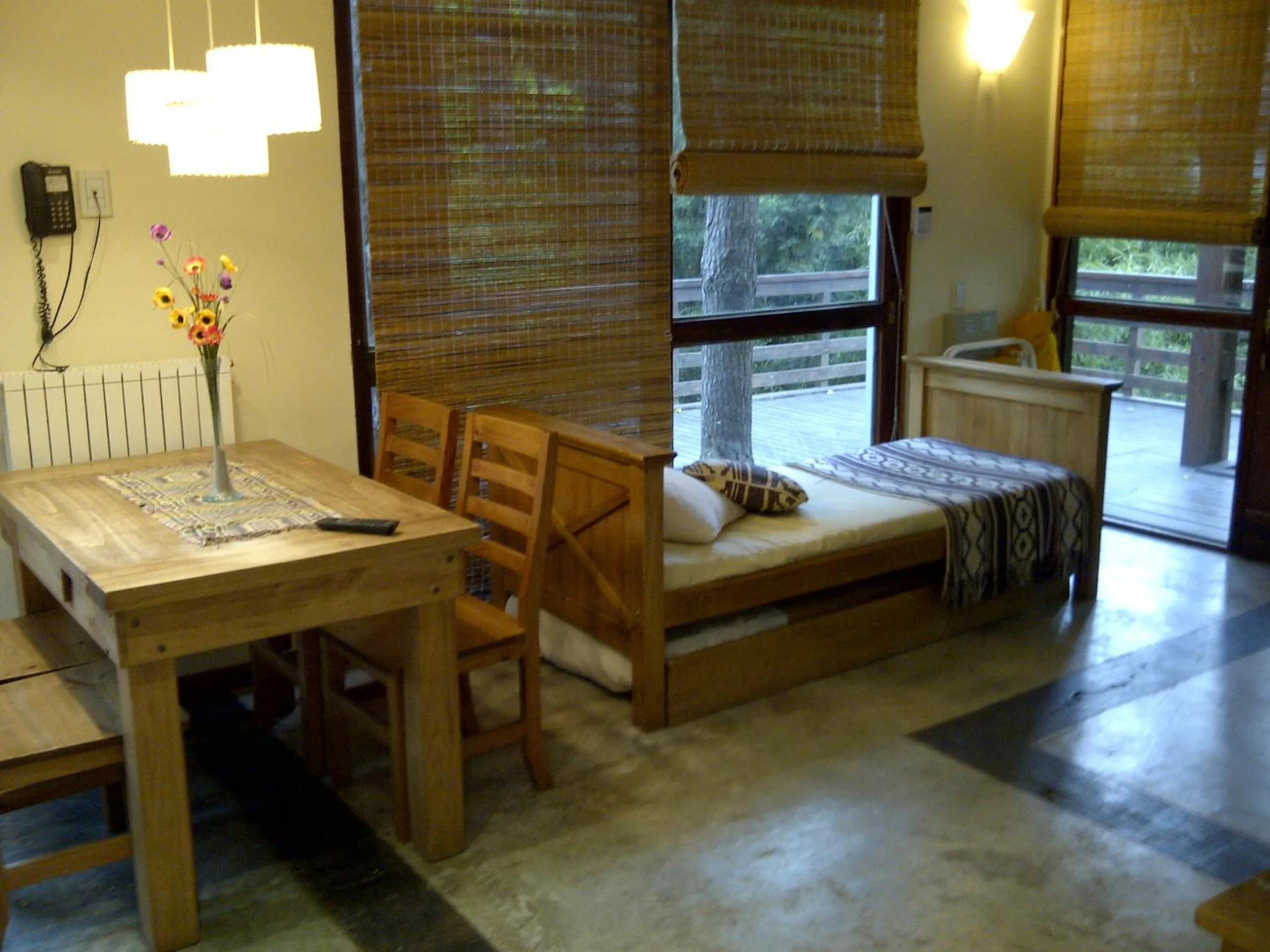 Living room, Bed in Altos Medanos Cabañas & Club de Bosque