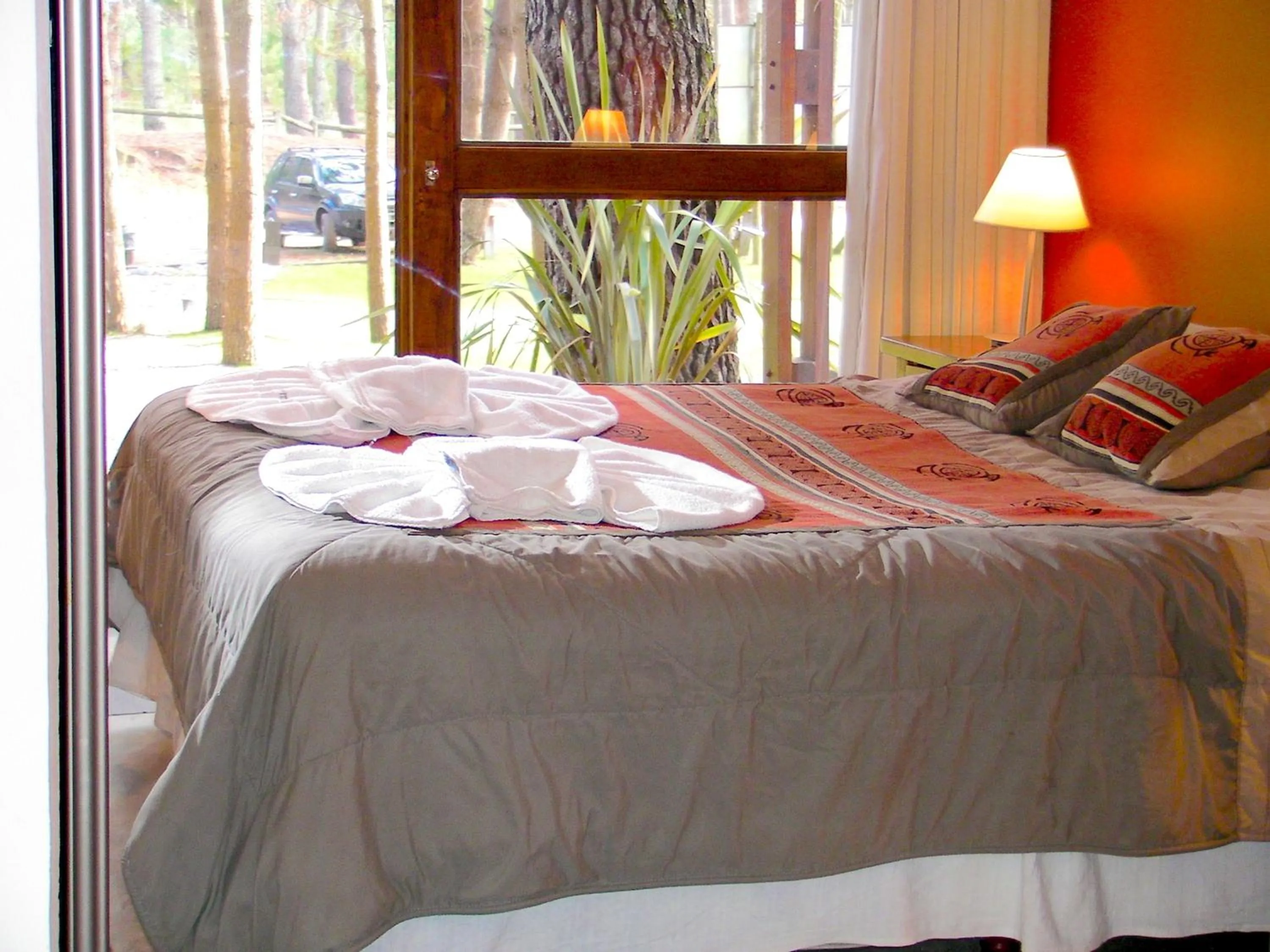 Photo of the whole room, Bed in Altos Medanos Cabañas & Club de Bosque