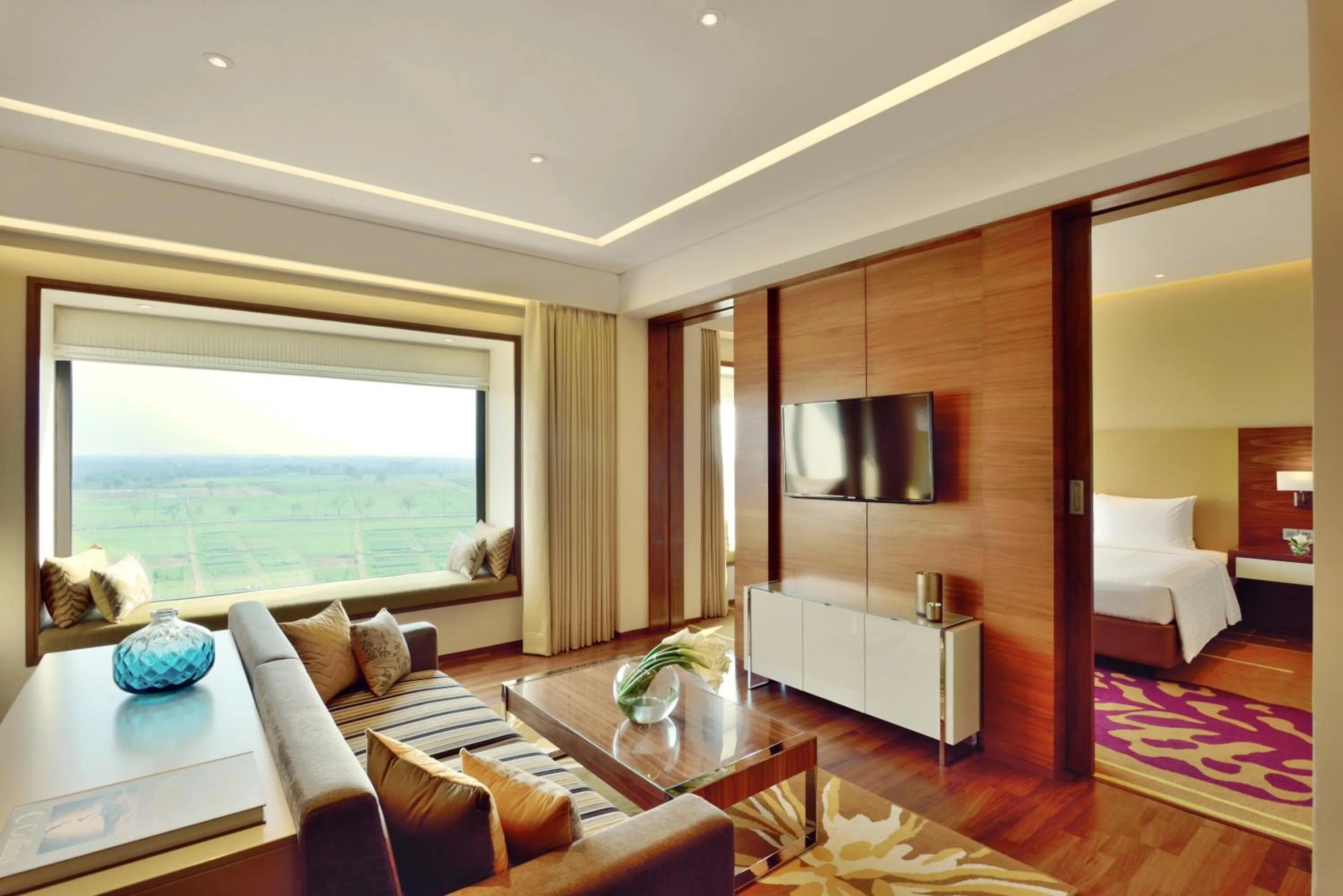 Living room, Bed in Courtyard by Marriott Raipur