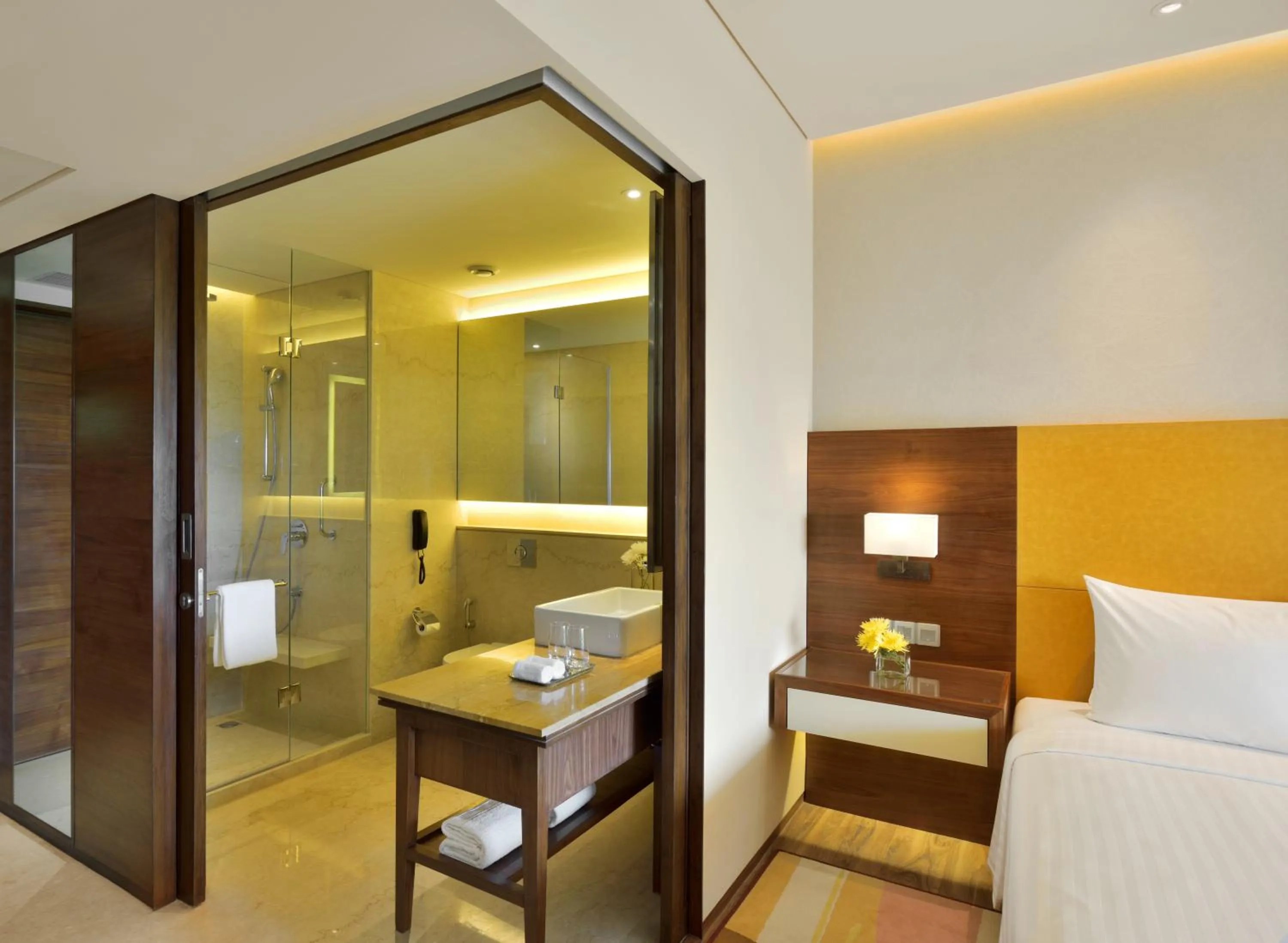 Shower, Bed in Courtyard by Marriott Raipur