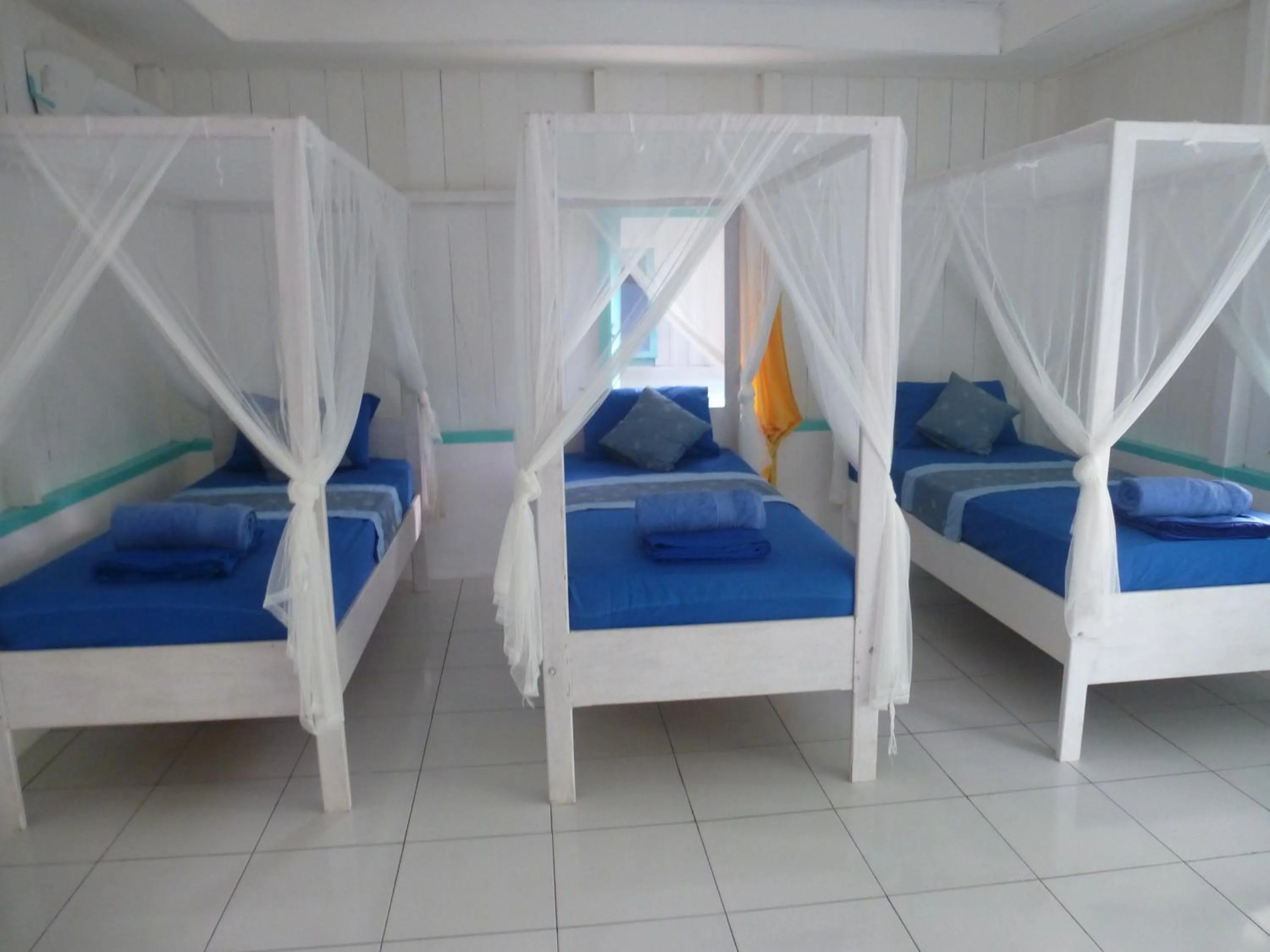 Bed in Scuba Republic Beach Bungalows