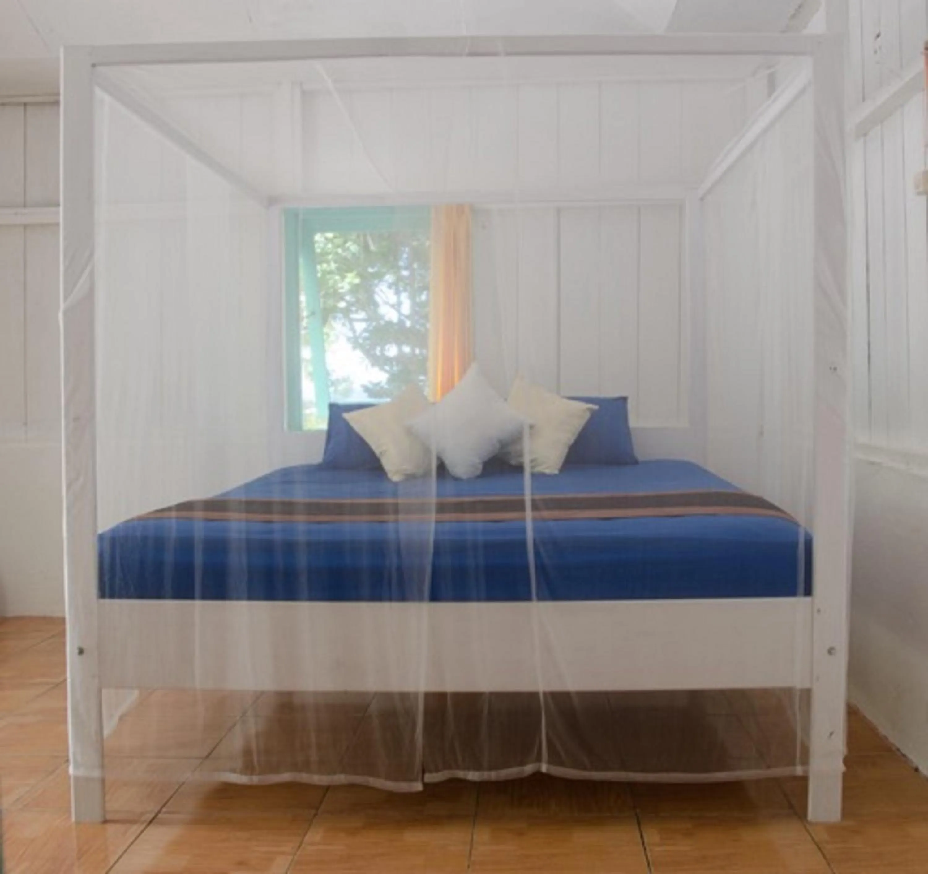 Bed in Scuba Republic Beach Bungalows