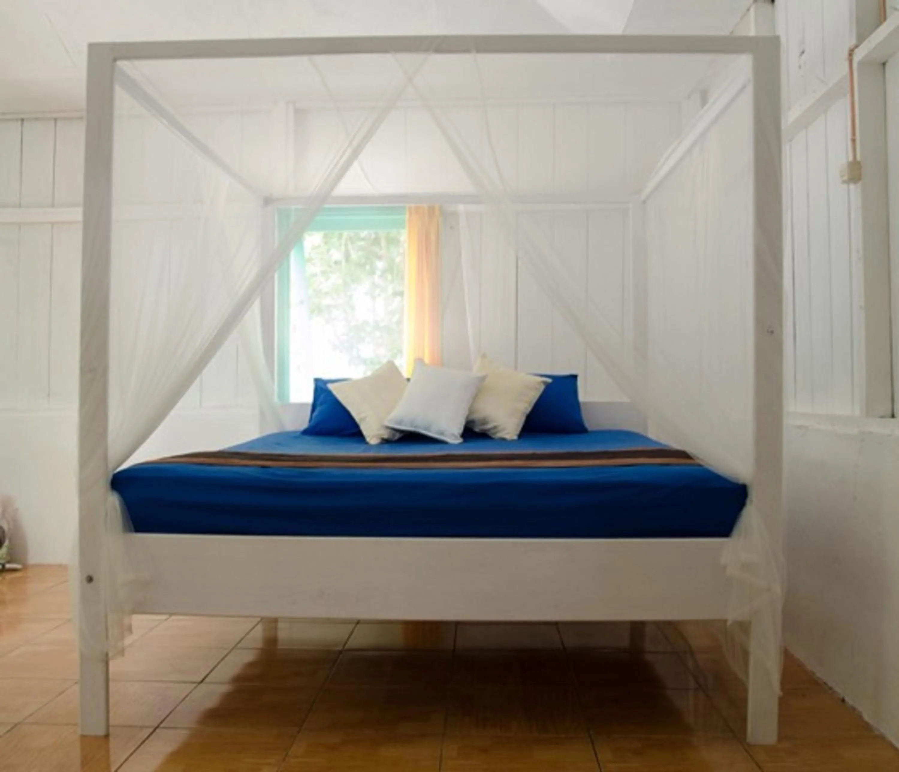 Bed in Scuba Republic Beach Bungalows