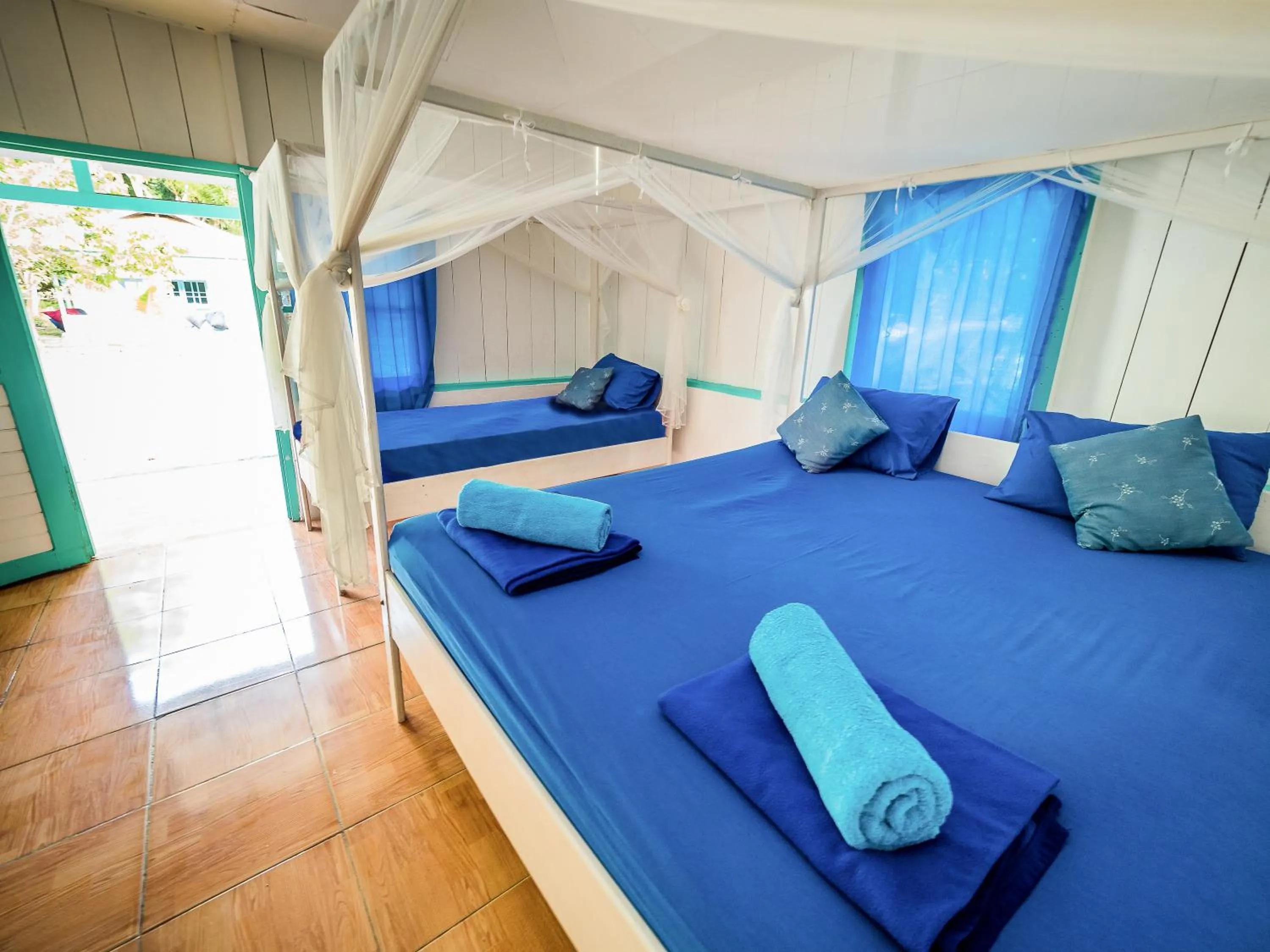 Bedroom in Scuba Republic Beach Bungalows