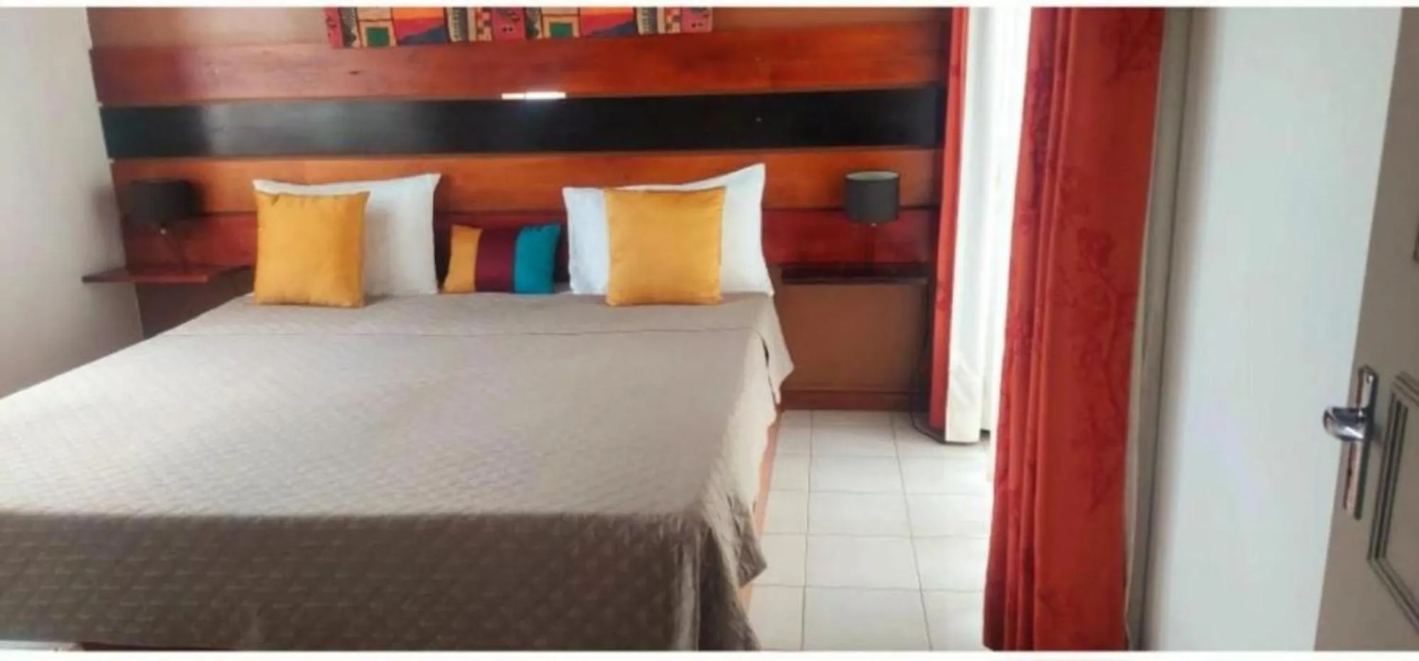 Bed in Ocean Villas Apart Hotel