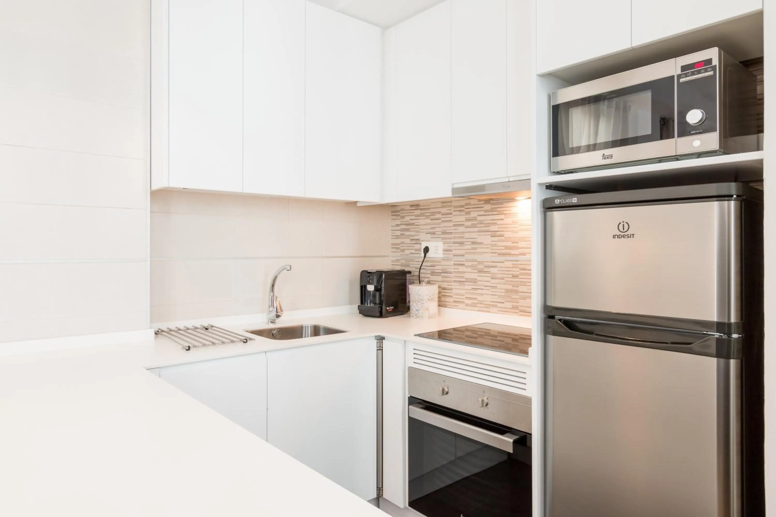 Kitchen or kitchenette in BiBo Suites Oro del Darro