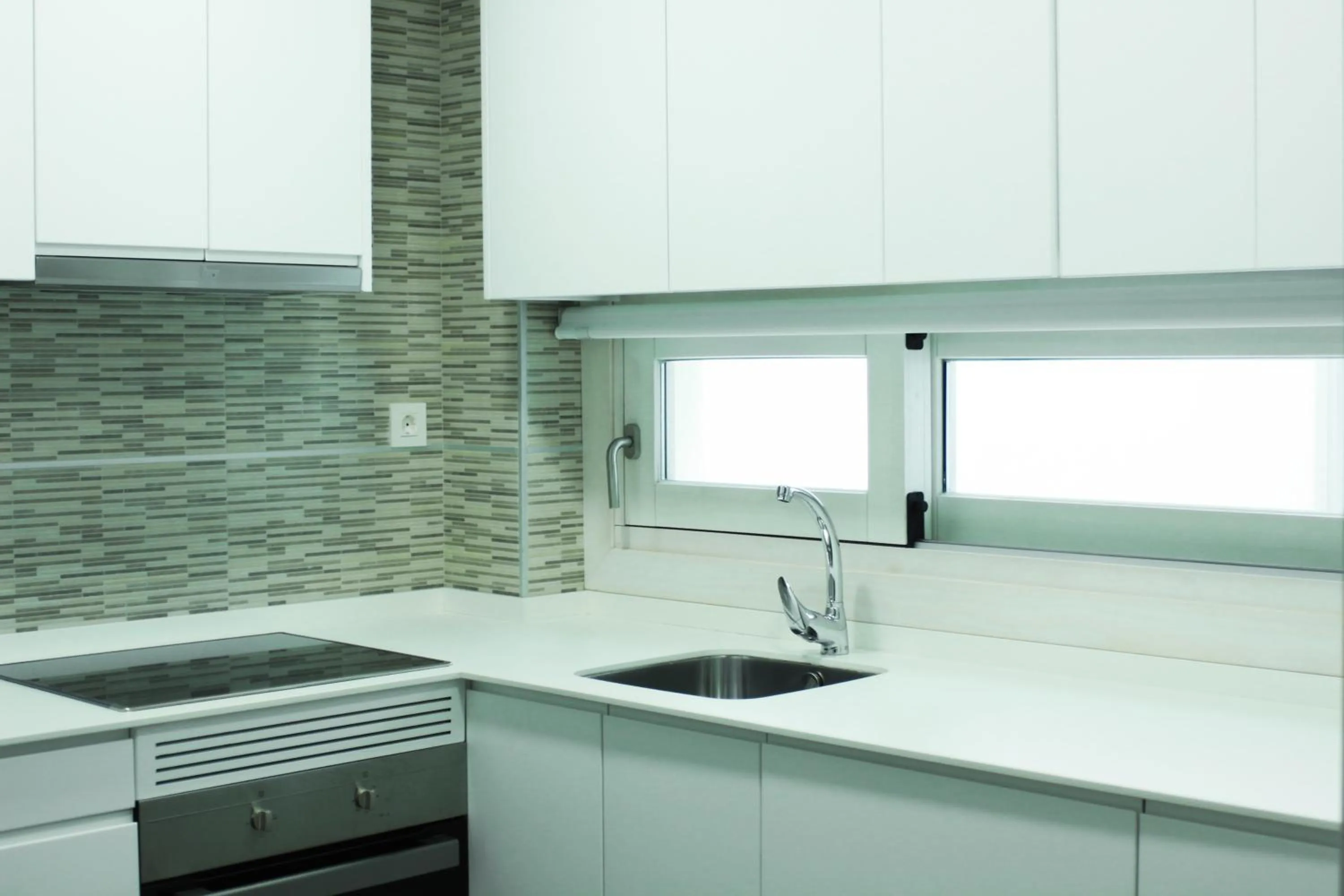 Kitchen or kitchenette in BiBo Suites Oro del Darro