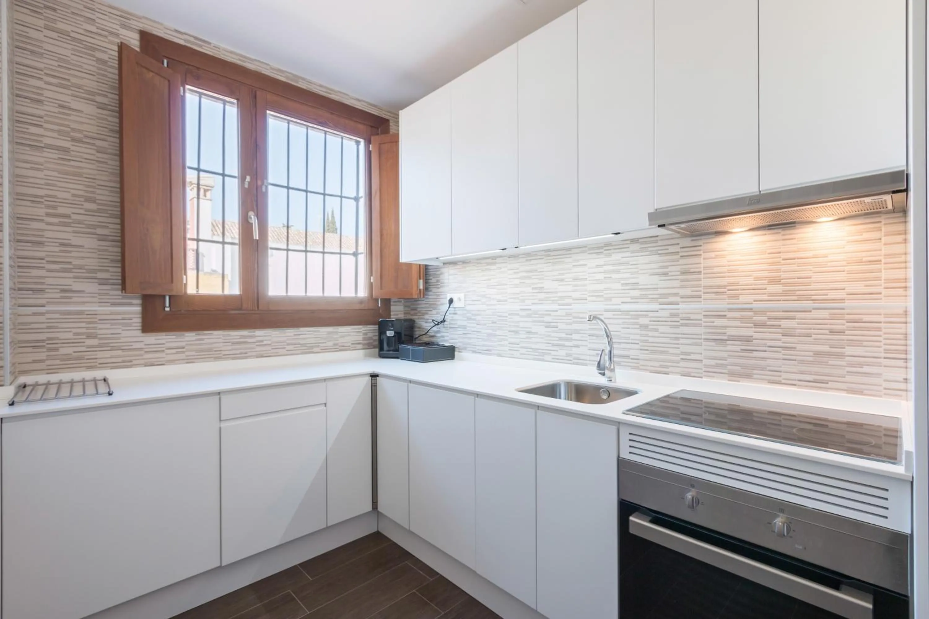 Kitchen or kitchenette in BiBo Suites Oro del Darro