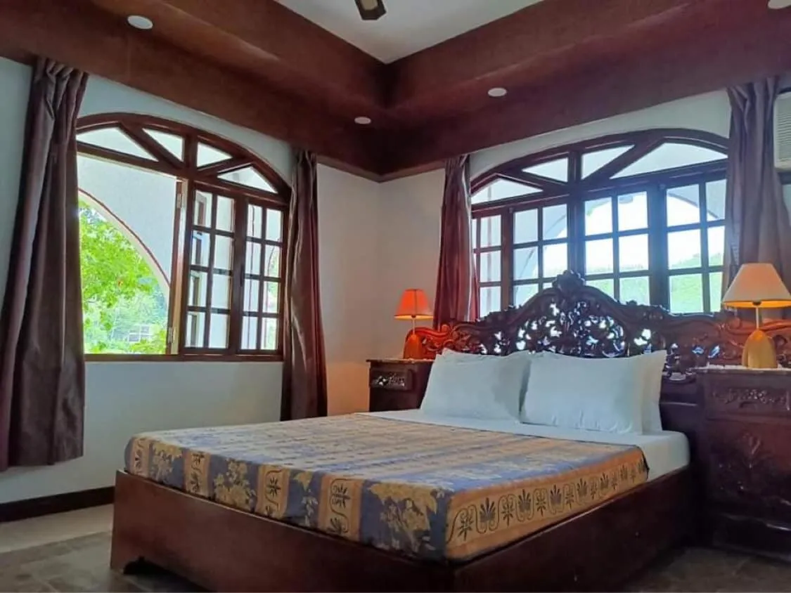 Bed in Blue Crystal Beach Resort