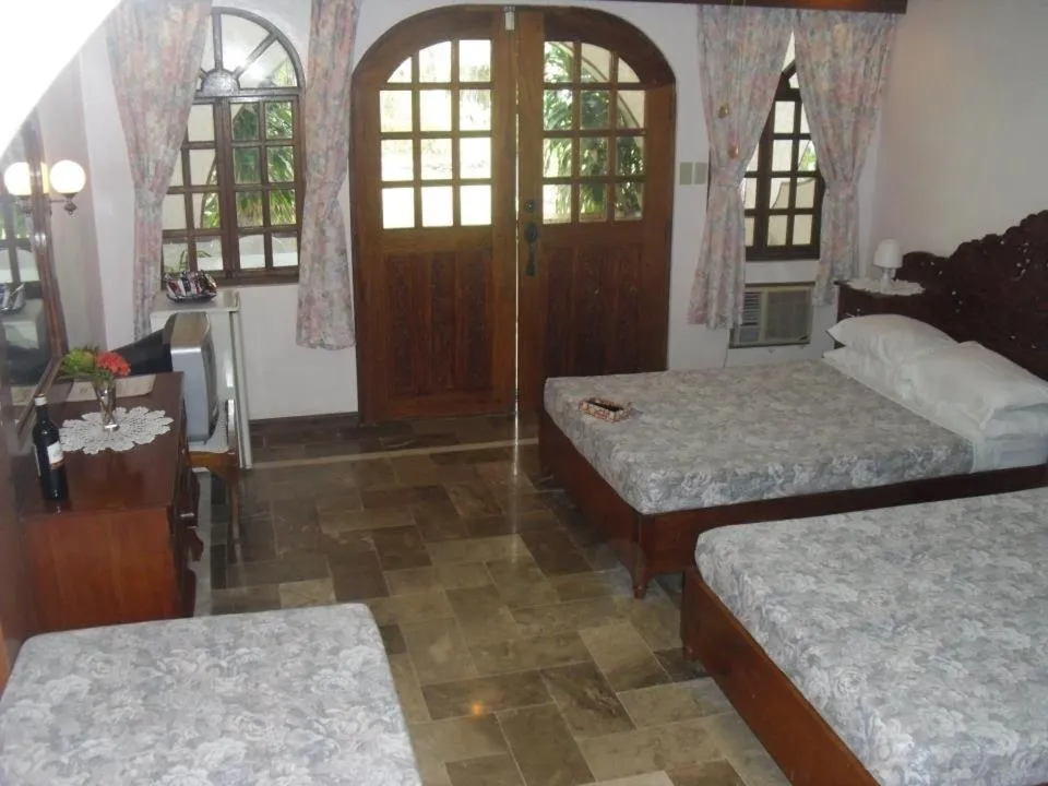 Bed in Blue Crystal Beach Resort