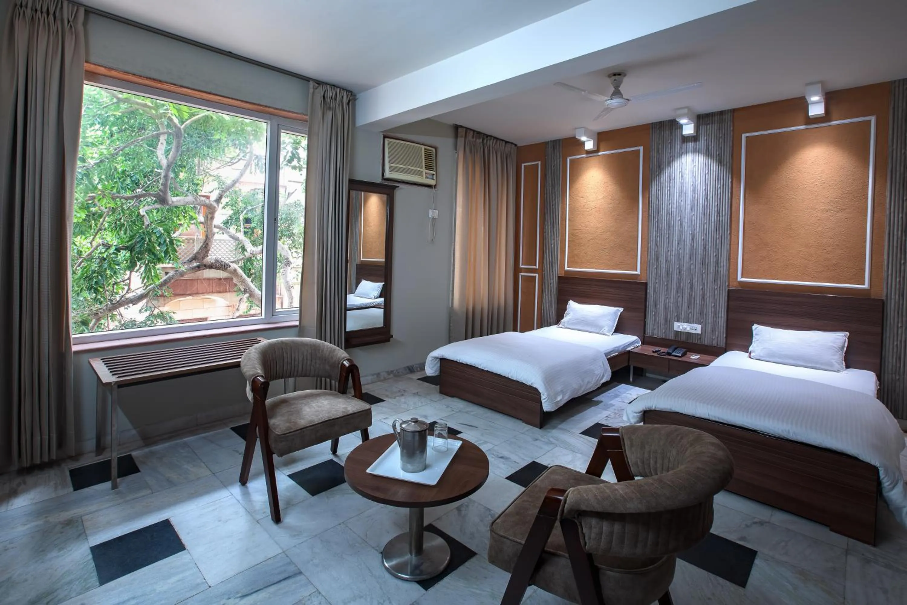 Bed in Hotel Bhakti Dhama