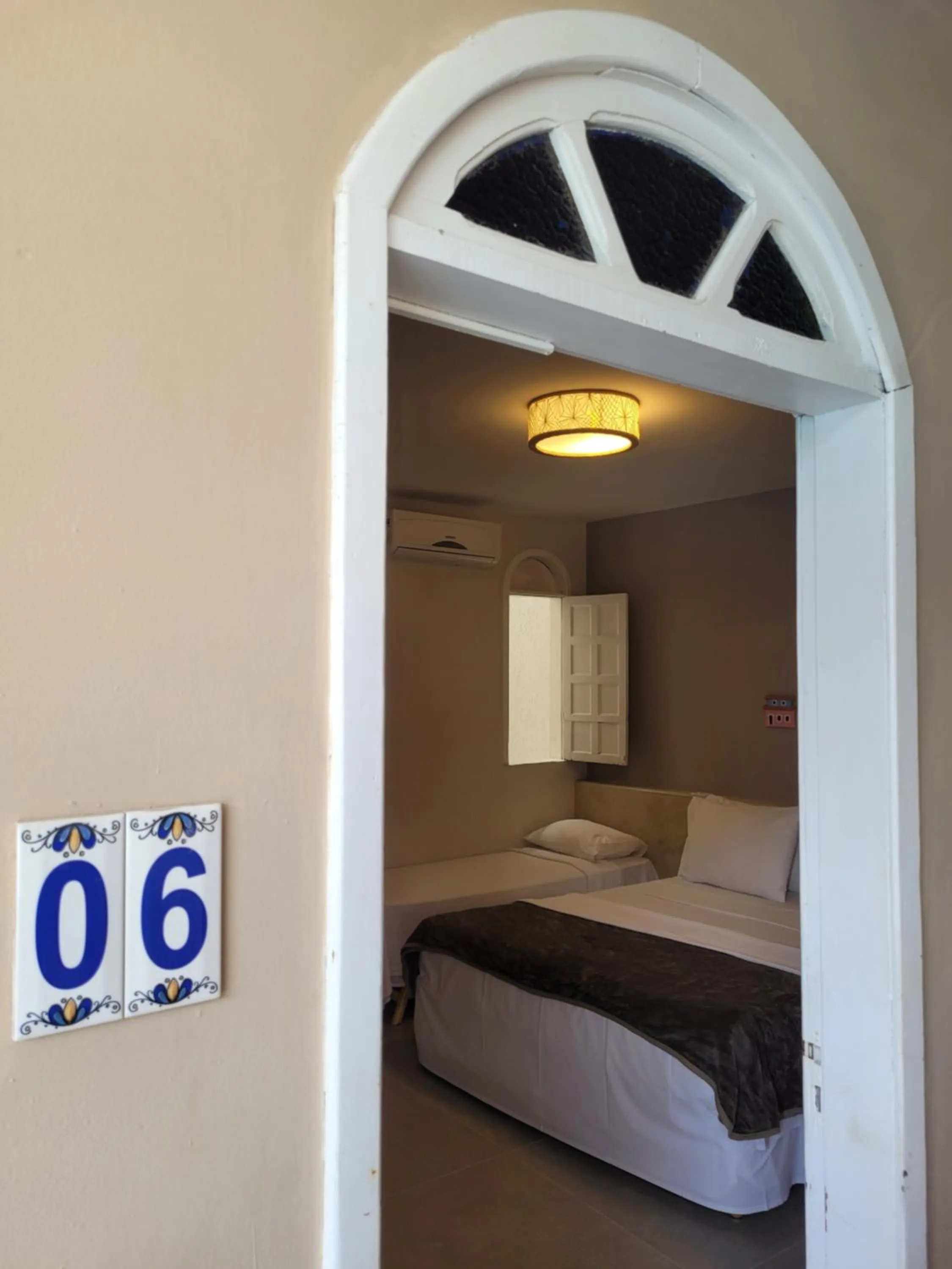 Bed in Pousada Jangadeiro