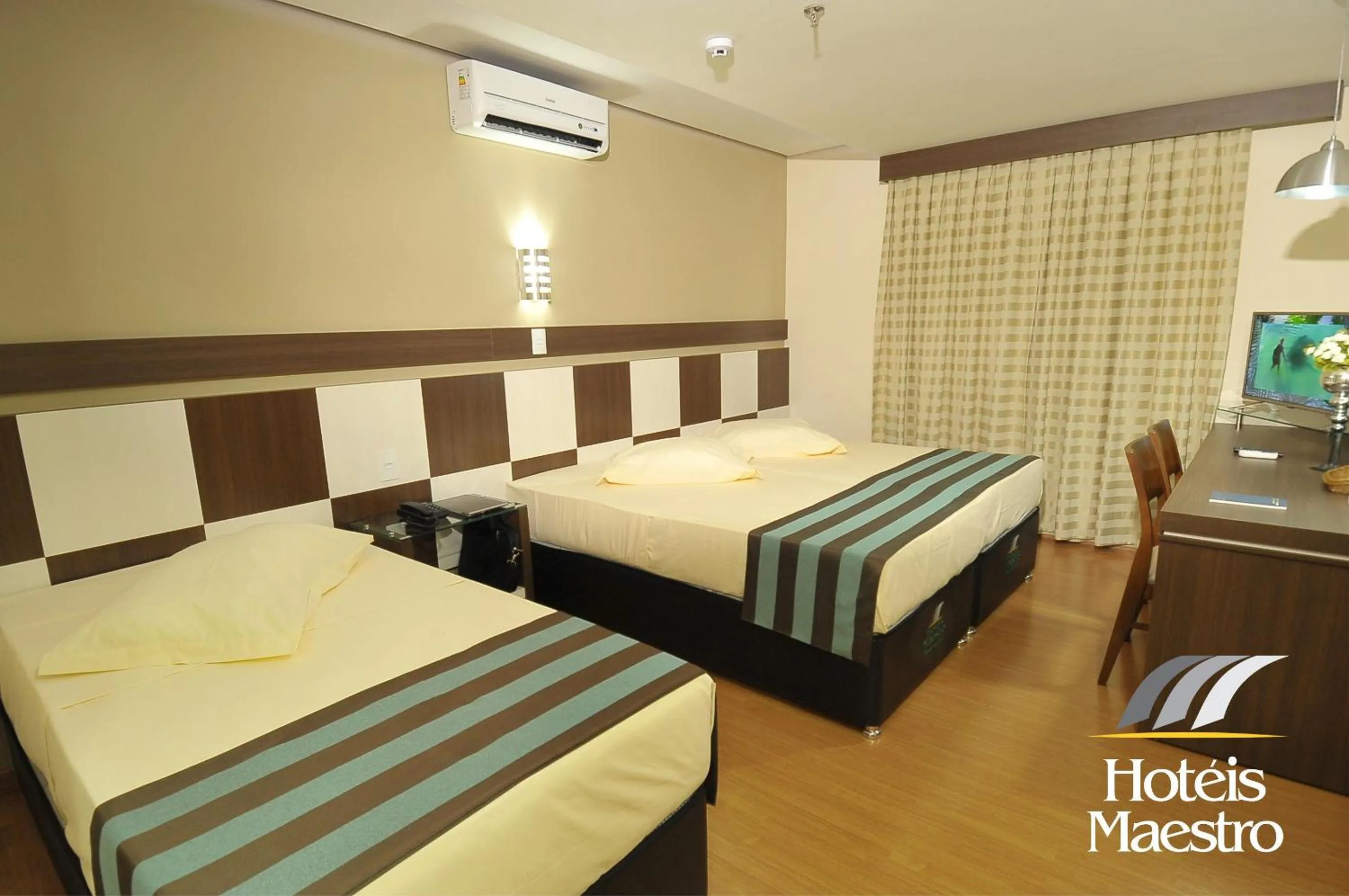 Bed in Hotel Maestro Premium Cascavel