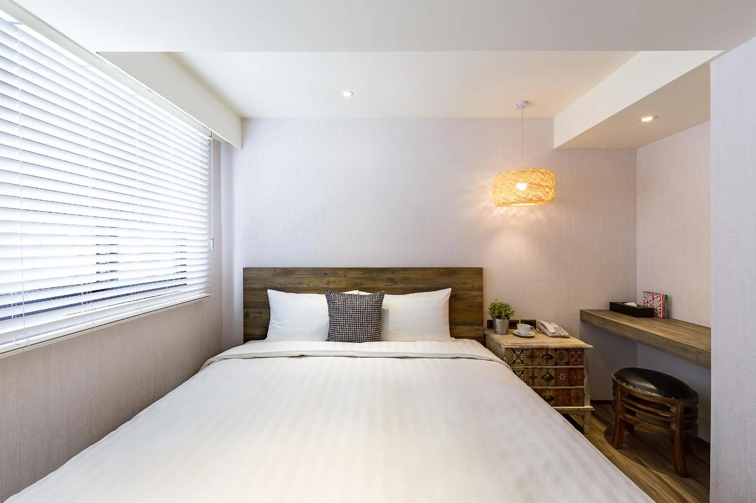 Bed in Lan Kwai Fong Garden Hotel