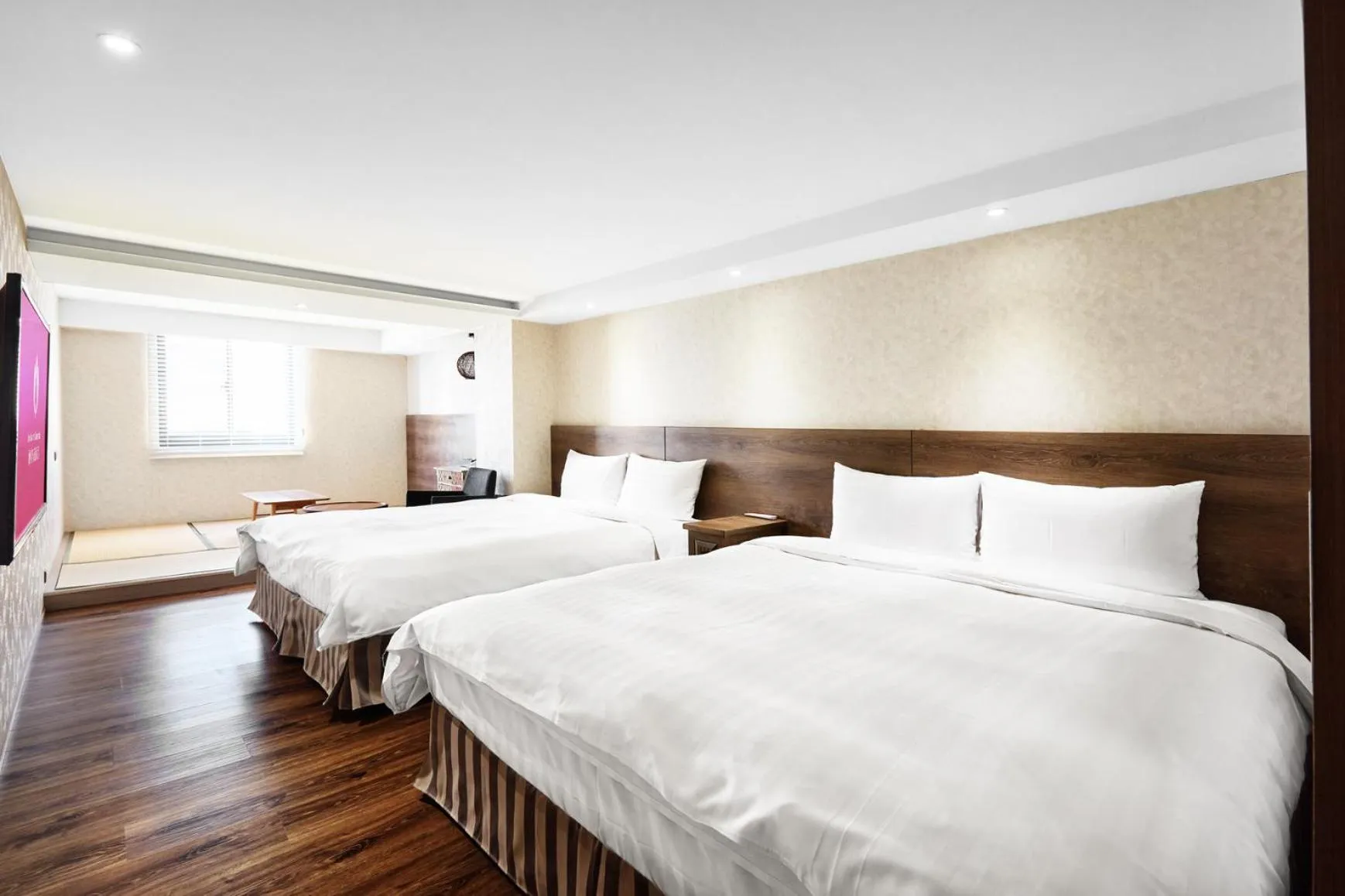 Bed in Lan Kwai Fong Garden Hotel