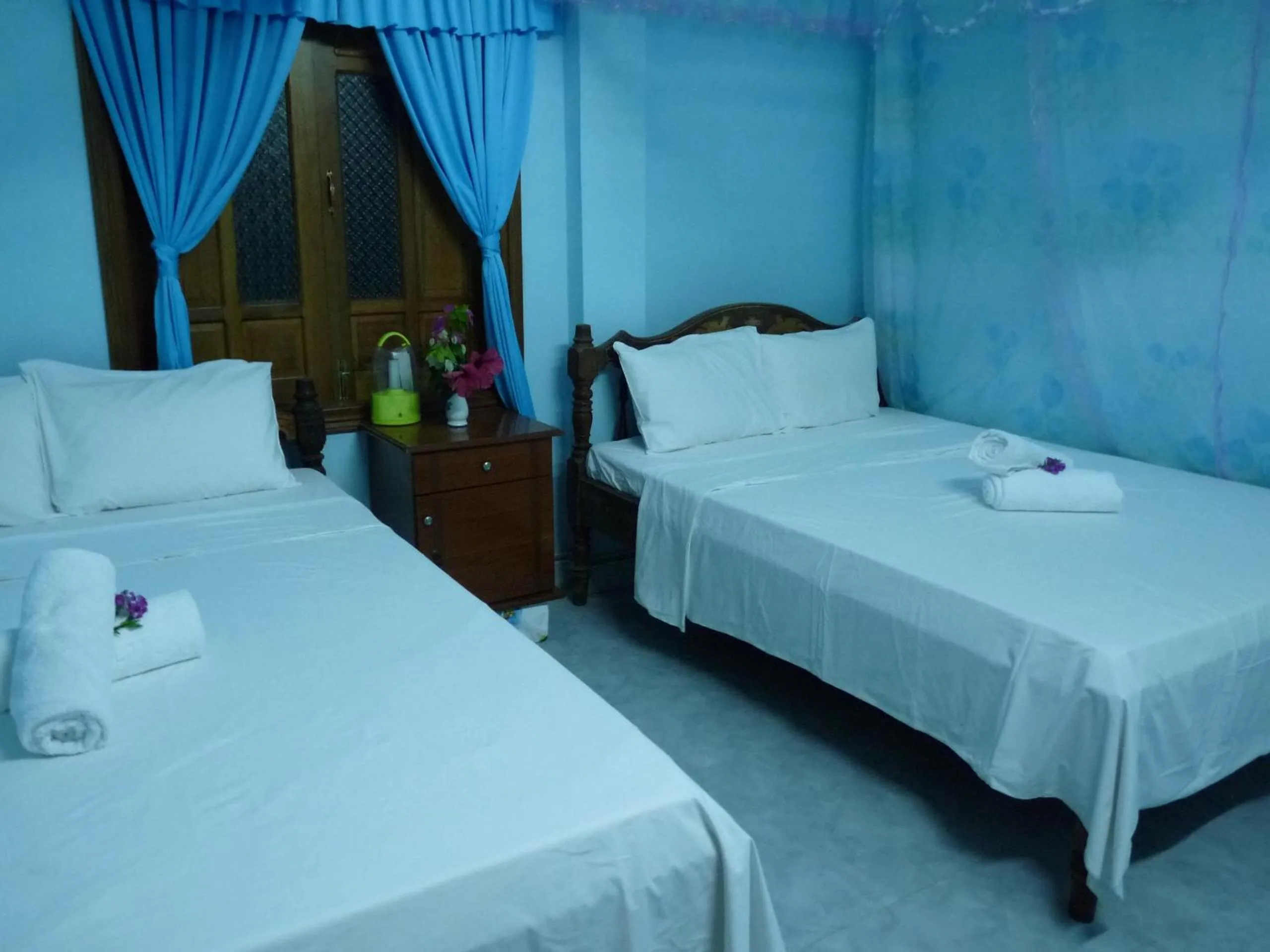 Bed in Cham Island Smiles Homestay