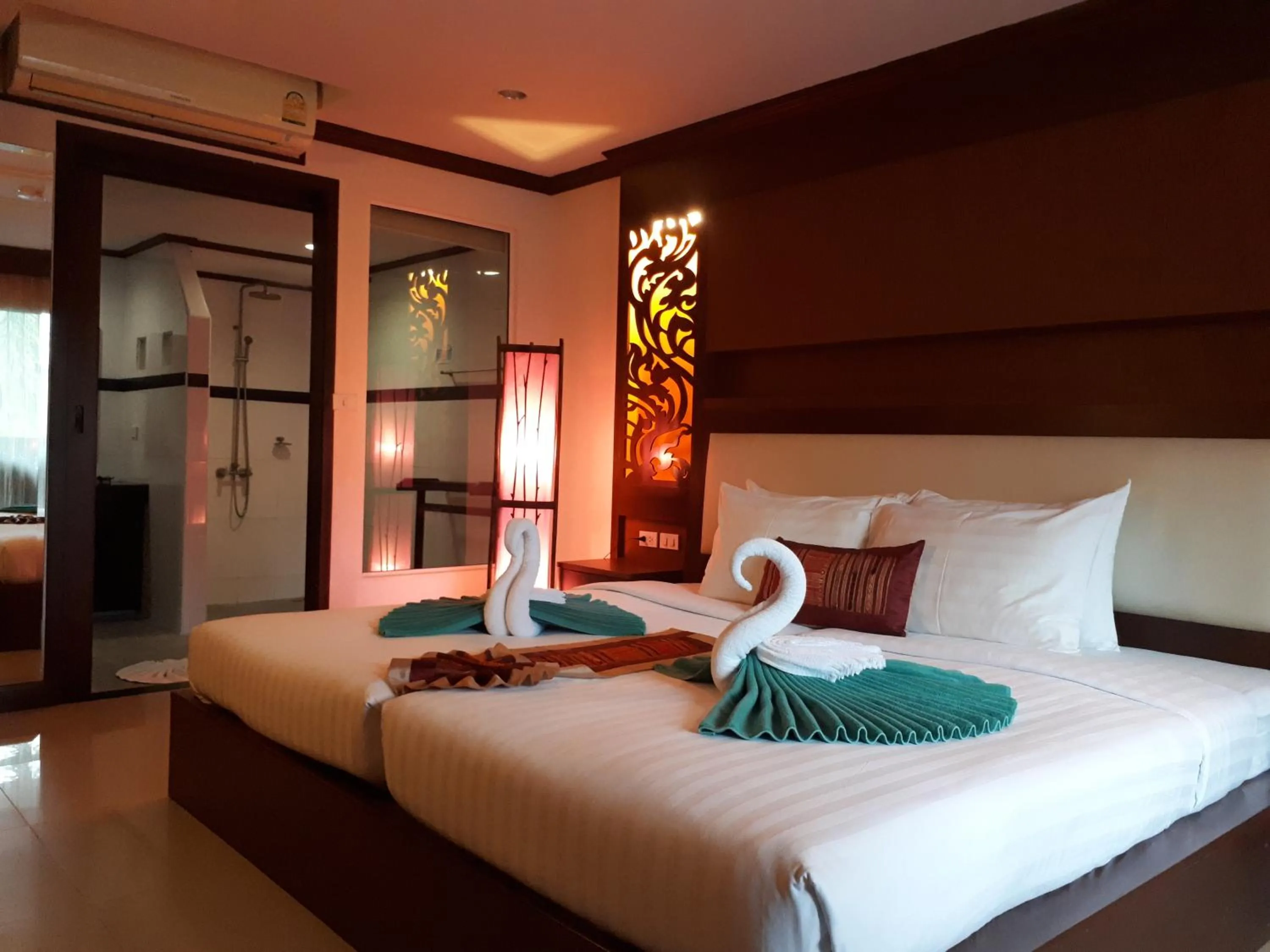 Bed in Chivatara Resort Bang Tao Beach Phuket - SHA