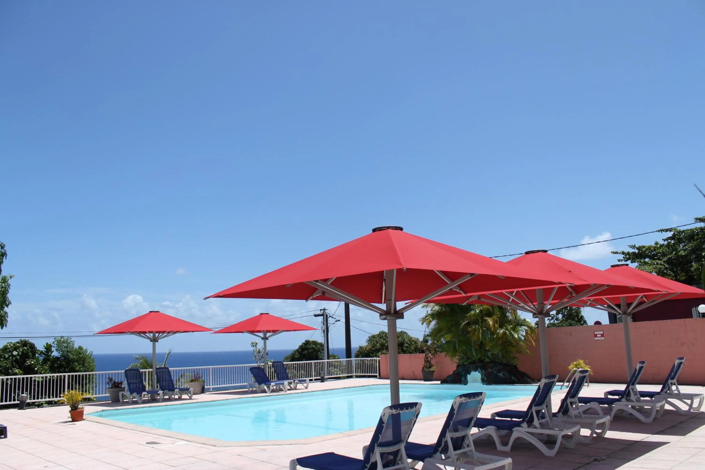 Swimming pool in La Fournaise Hotel Restaurant
