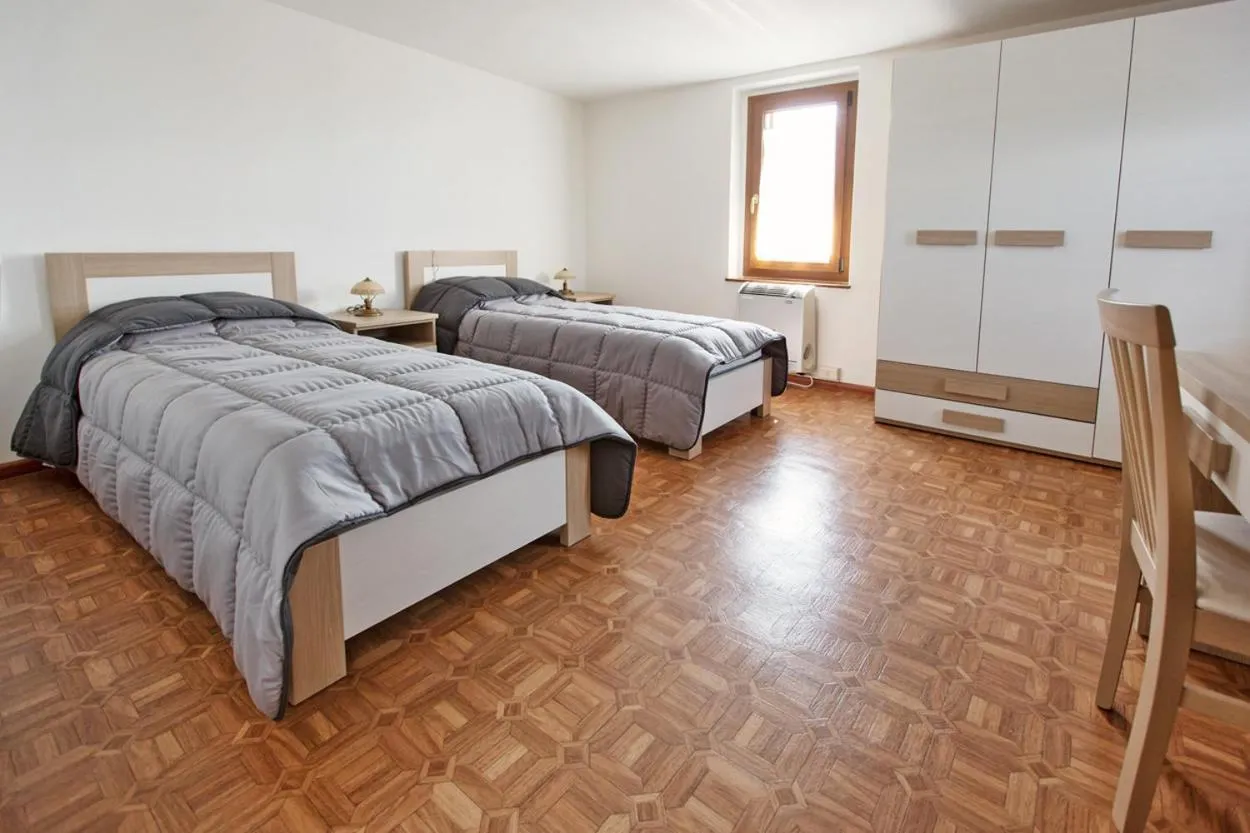 Photo of the whole room, Bed in Albergo Diffuso "Col Gentile" Socchieve