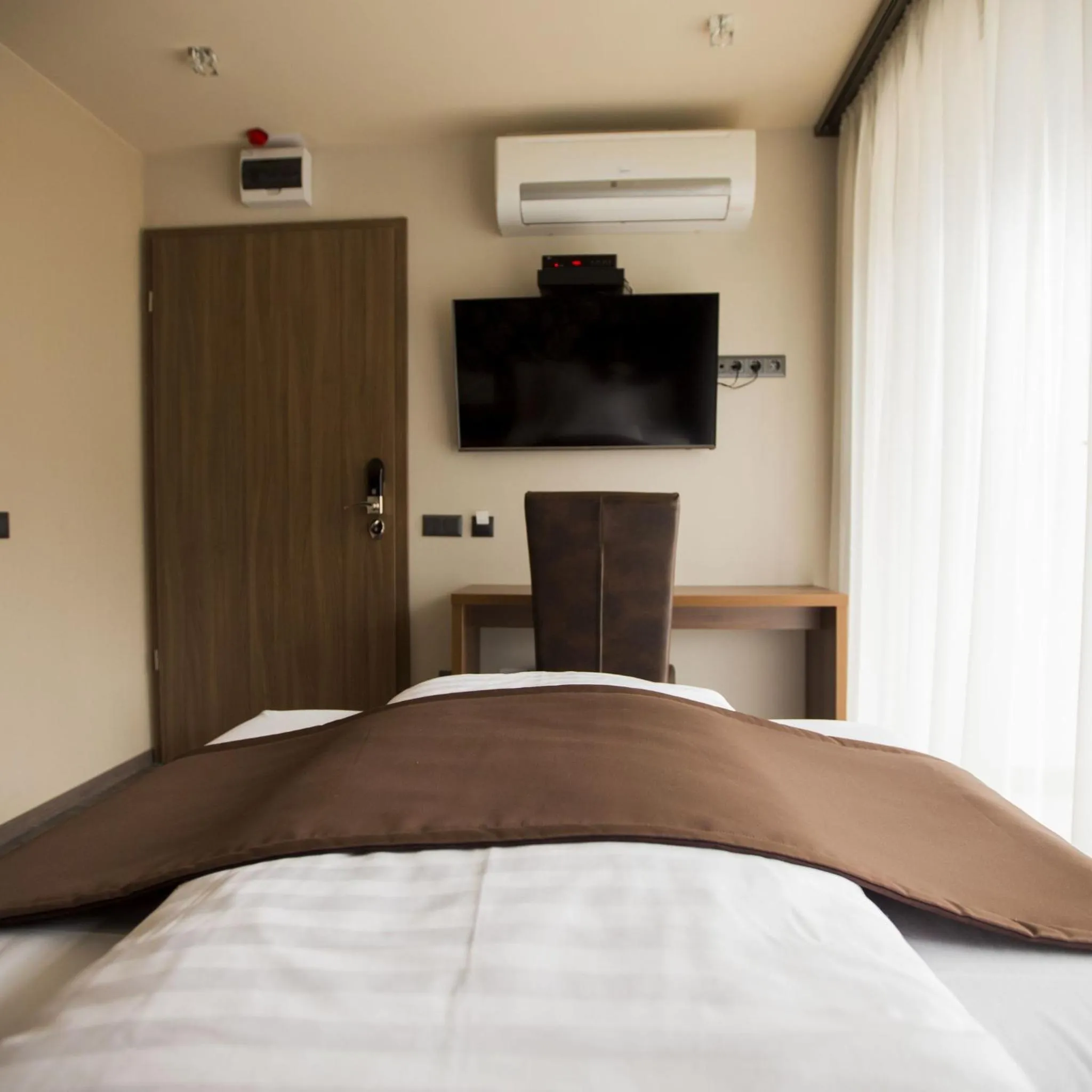 Bed in Pole Position Beach Hotel