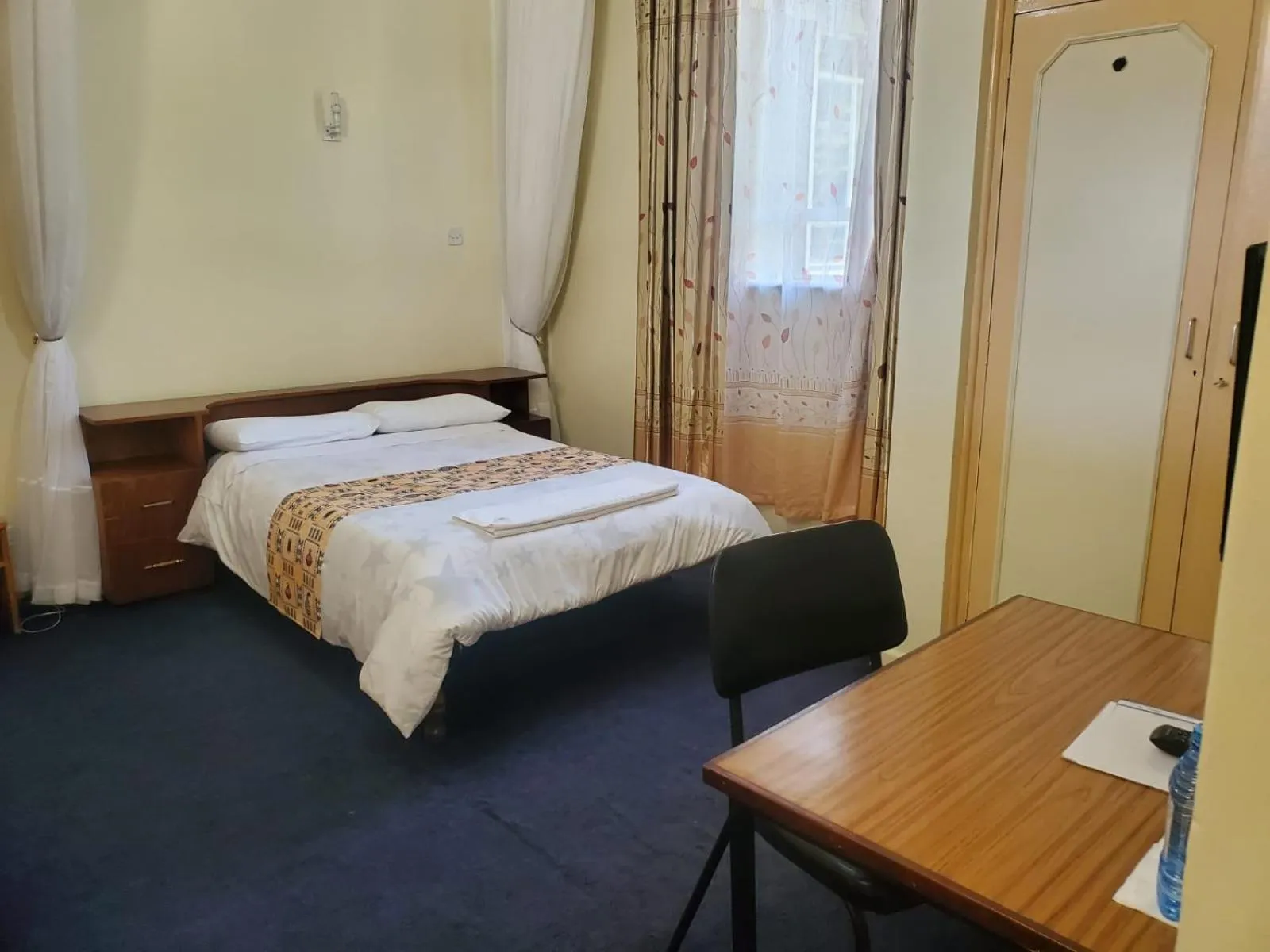 Bed in Adventist LMS Guest House & Conference Centre