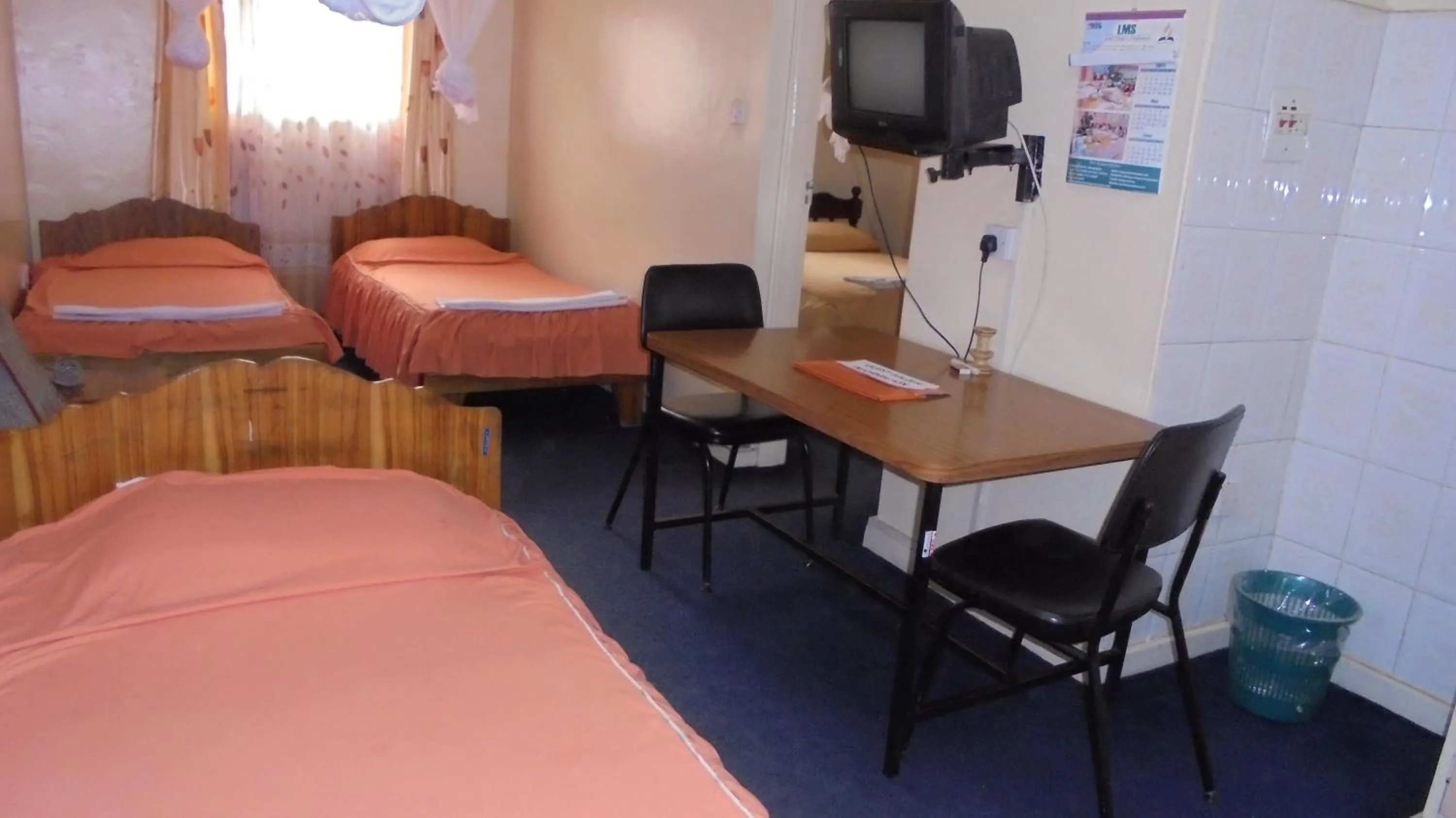 Bedroom, Bed in Adventist LMS Guest House & Conference Centre