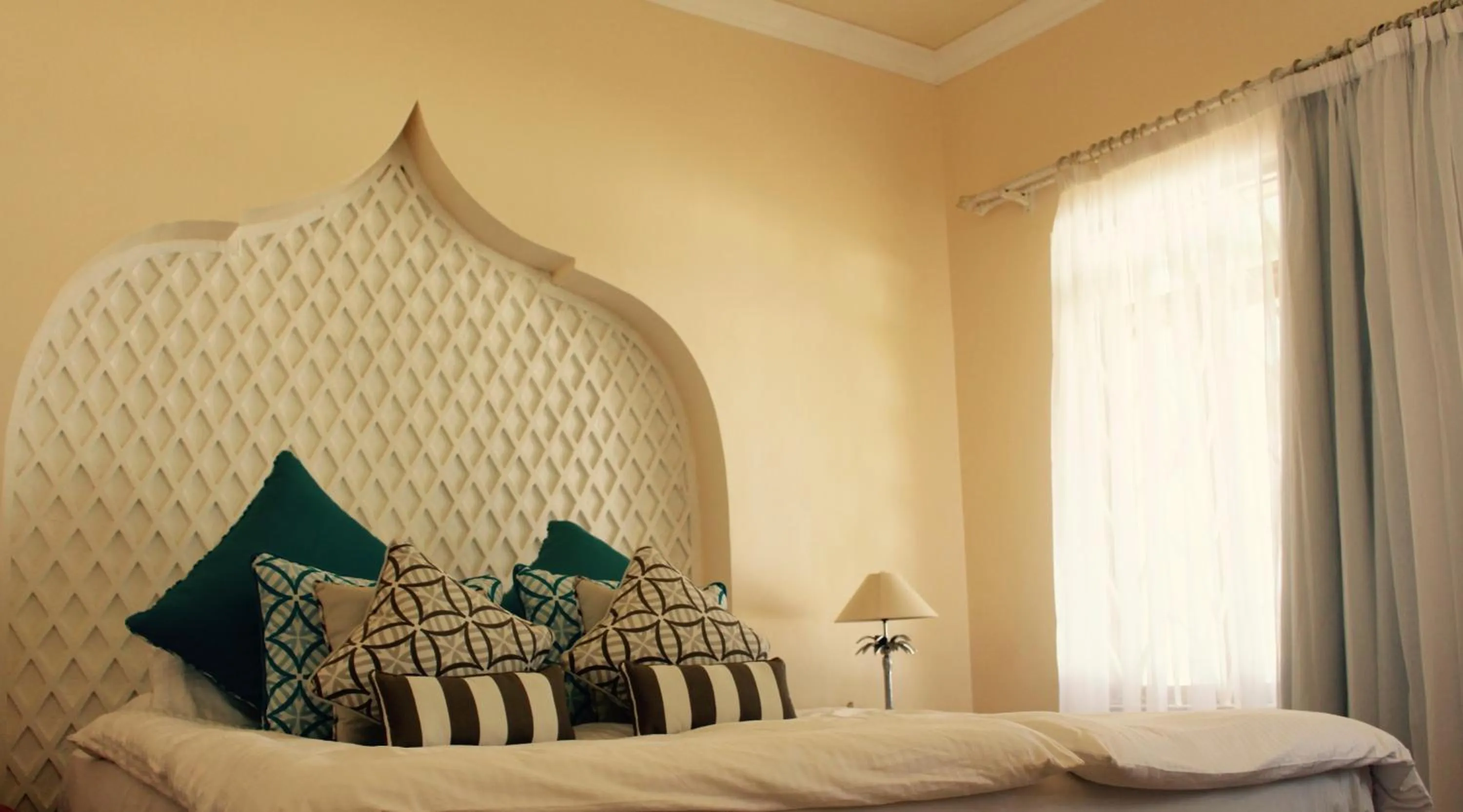 Bed in The Zubeida Boutique Resort