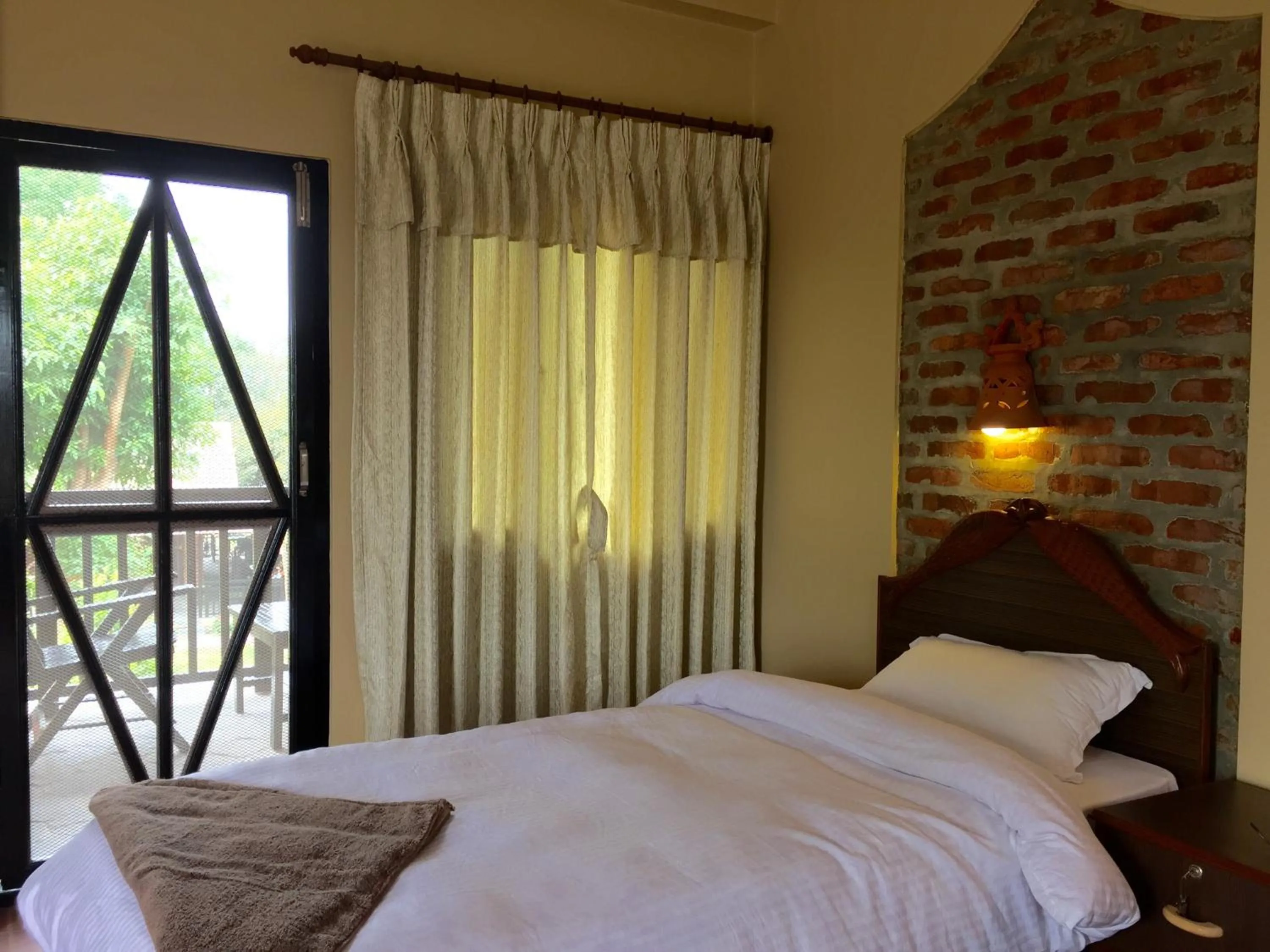 Balcony/Terrace, Bed in Chautari Garden Resort