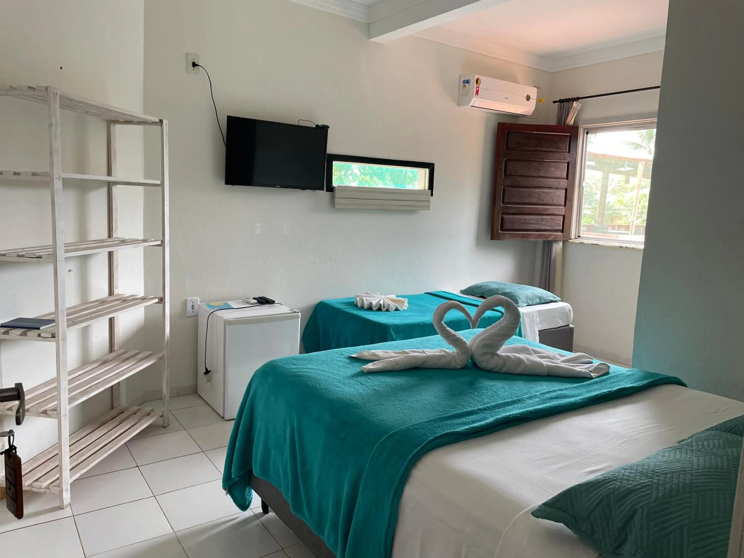 Bed in Pousada Vôo da Águia